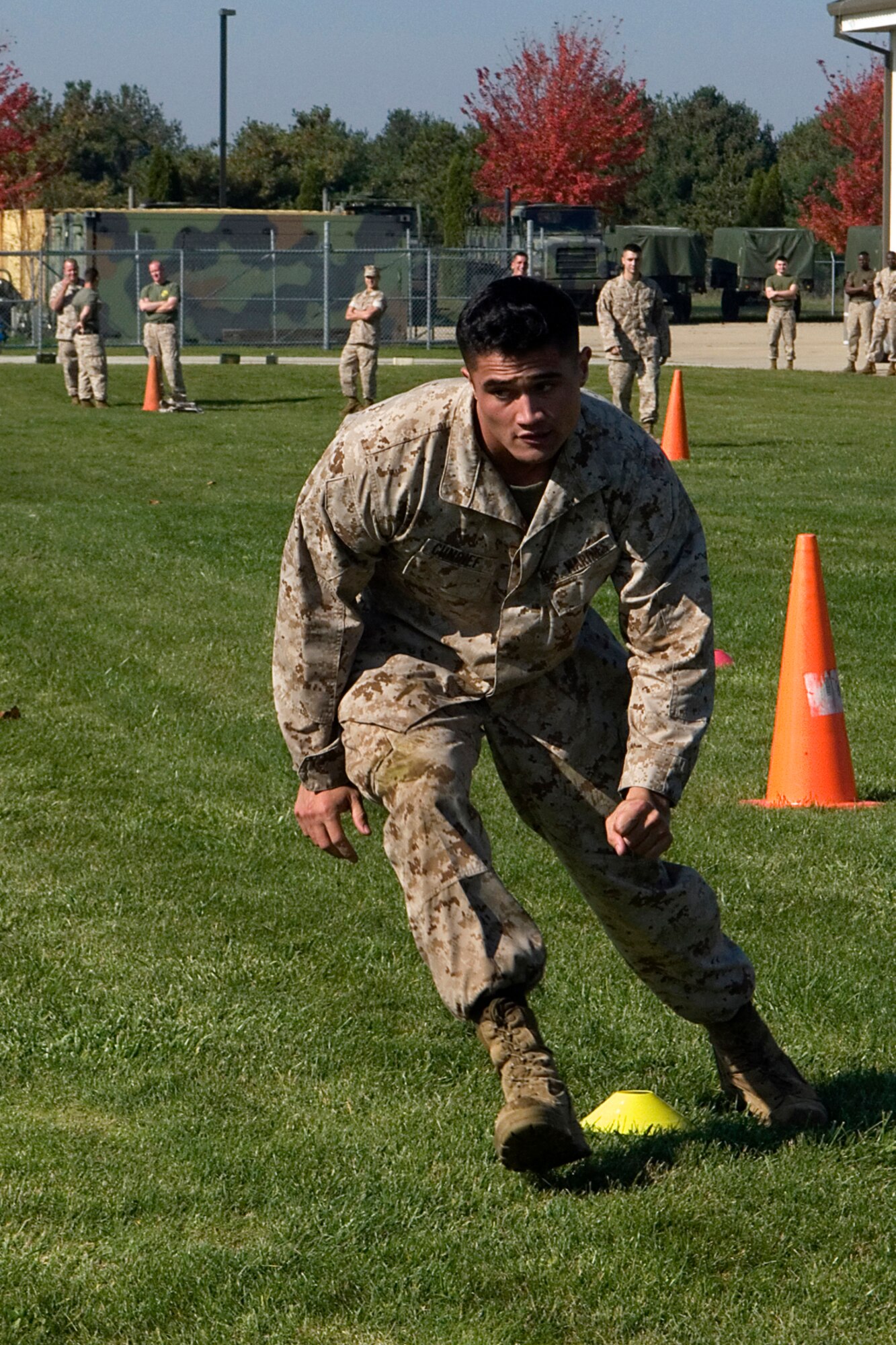 U.S. Marine Corps LCPL Ryan Cindiff, a field radio operator from Detachment 1, Communication Company, Combat Logistics Regiment 45, 4th Marine Logisitics Group, quickly zigzags through the course during a recent combat fitness test held at Grissom Air Reserve base, Ind., Oct. 25, 2014. The CFT is part of a yearly requirement for Marines to assess combat physical fitness and readiness. (U.S. Air Force photo/Senior Airman Jami K. Lancette)