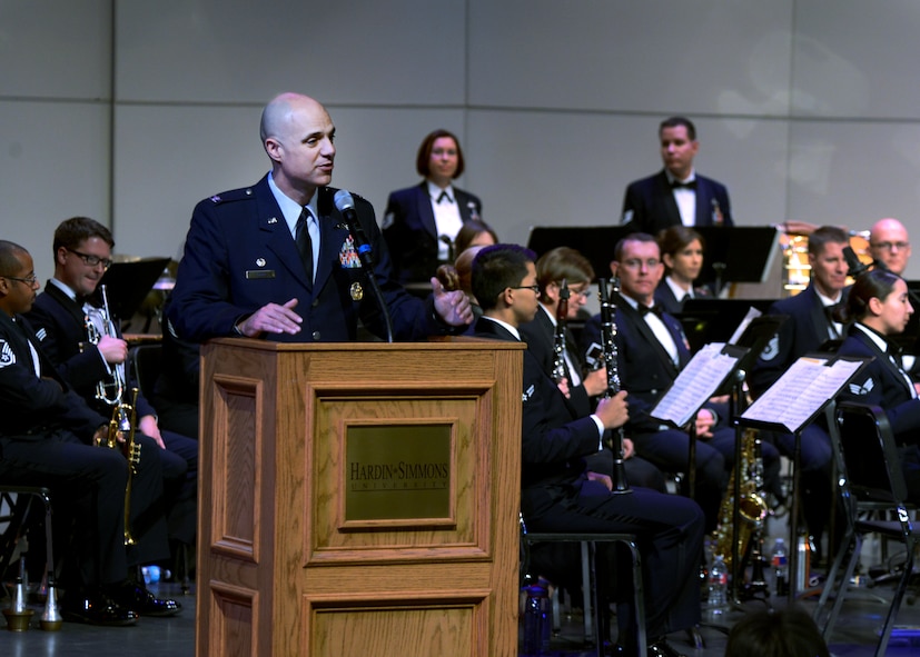 U.S. Air Force Col. Michael Bob Starr, 7th Bomb Wing commander, speaks before a musical presentation by the Air Force Band of the West Nov. 9, 2014, at Hardin-Simmons University in Abilene, Texas. Starr welcomed the band to Abilene after thanking the University and community for making the event possible. (U.S. Air Force photo by Senior Airman Peter Thompson/Released)