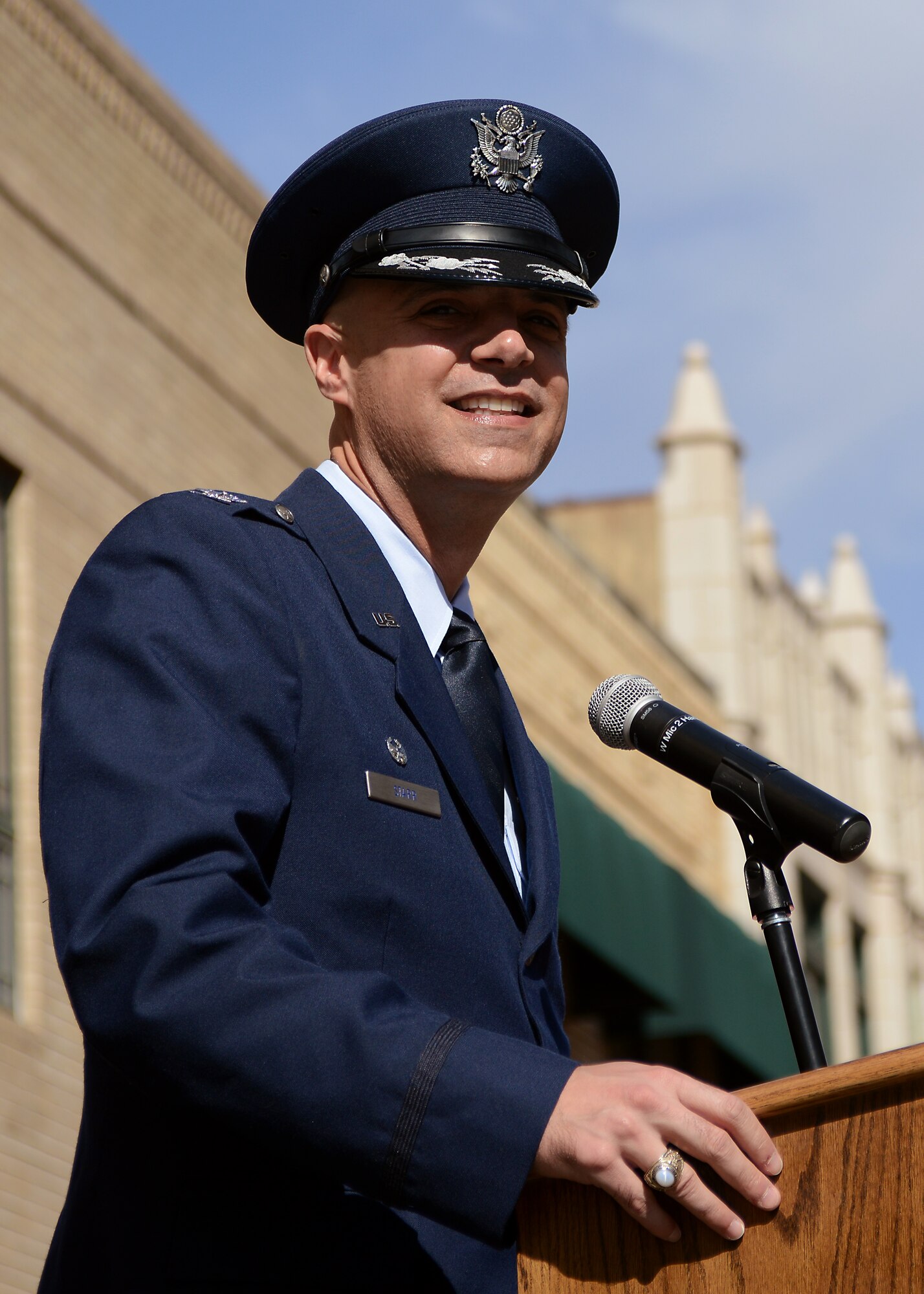 U.S. Air Force Col. Michael Bob Starr, 7th Bomb Wing commander, speaks during the annual Taylor County Veterans Day parade Nov. 8, 2014, in Abilene, Texas. Starr addressed the audience by thanking them for their unending support of Dyess and the Air Force as a whole. (U.S. Air Force photo by Senior Airman Peter Thompson/Released)