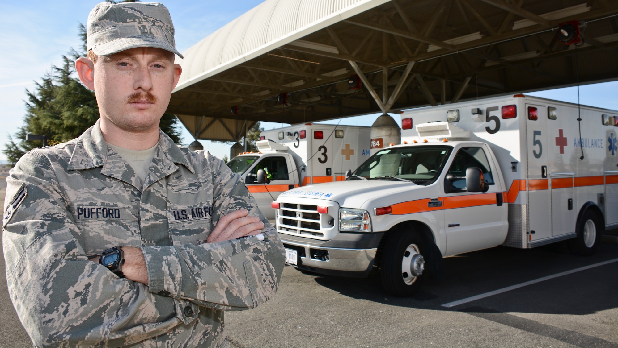 Airman 1st Class Curtis Pufford, 60th Medical Operations Squadron medical technician, poses for a photo Nov. 4 at Travis Air Force Base. Pufford performs pre-hospital response as an emergency medical technician for Travis and responds with fire and security forces. (U.S. Air Force photo by Airman 1st Class Amber Carter)
