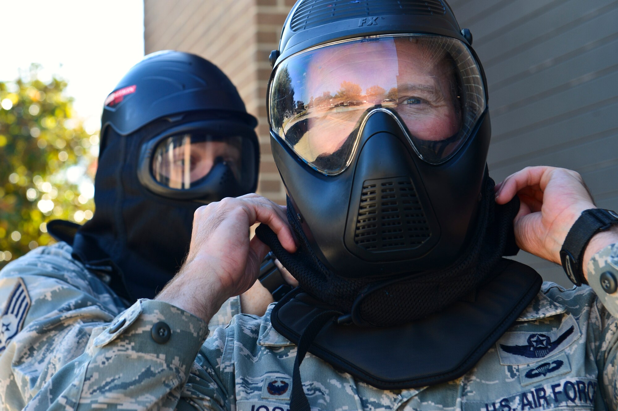 U.S. Air Force Col. Stephen Jost, 20th Fighter Wing commander, dons a face mask before entering the 20th Security Forces Squadron shoot house at Shaw Air Force Base, S.C., Oct. 27, 2014. The shoot house is where the 20th Security Forces Squadron Airmen train for incidents when lethal force may be needed. (U.S. Air Force photo by Senior Airman Tabatha Zarrella/Released)