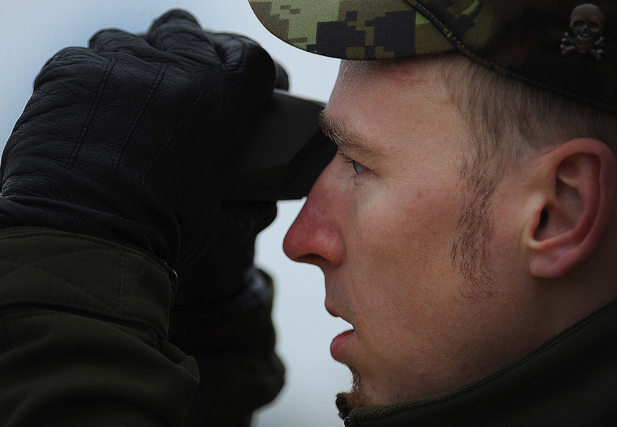 An Estonian air force joint tactical air controller, looks for a target at the training range Nov. 13, 2014, near Tapa, Estonia. The joint-training is designed to provide a broad range of training opportunities between NATO allies. (U.S. Air Force photo/Senior Airman Matthew Lotz)