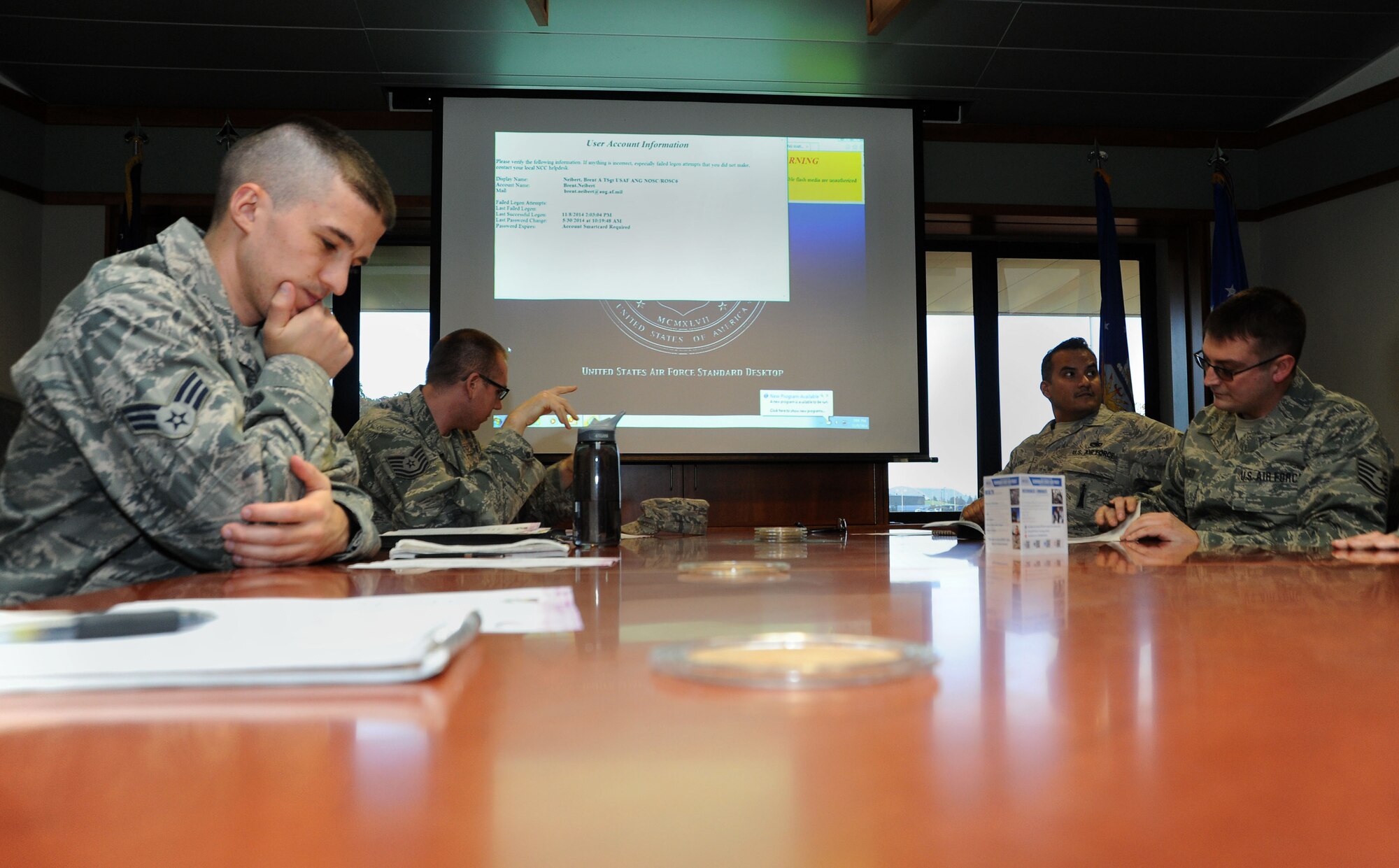 Senior Airman Miles Dodge, left, participates in the Junior Enlisted Council meeting taking place on Nov. 8, 2014, Portland Air National Guard Base, Ore. (U.S. Air National Guard photo by Staff Sgt. Brandon Boyd)