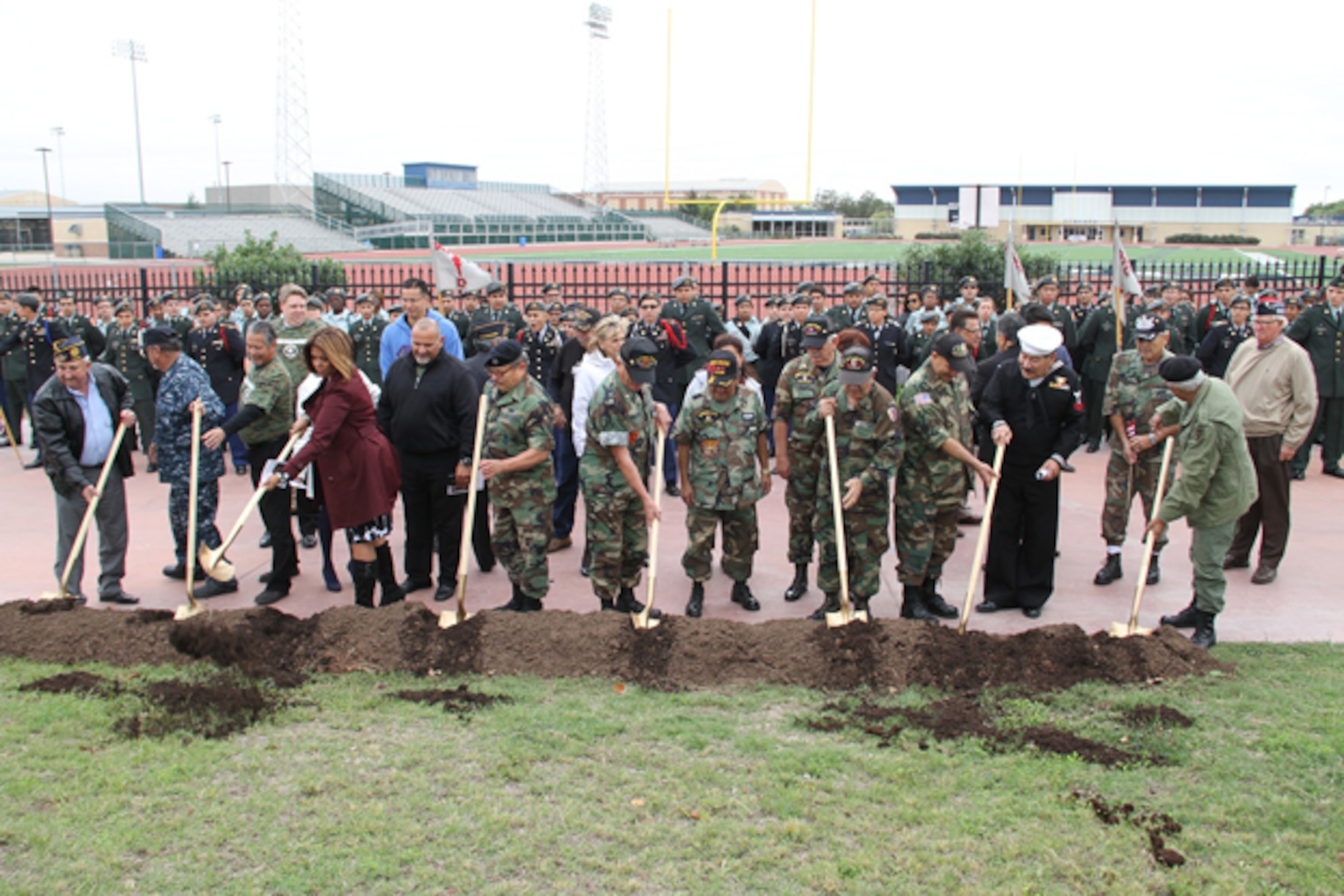 A groundbreaking ceremony was held at South San Antonio High School, Nov. 11, 2014, for a veteran’s memorial that will be erected on the campus later next year. The memorial is meant to commemorate native San Antonio veterans, from across the military services, who have lost their lives serving their country. (Courtesy Photo) 