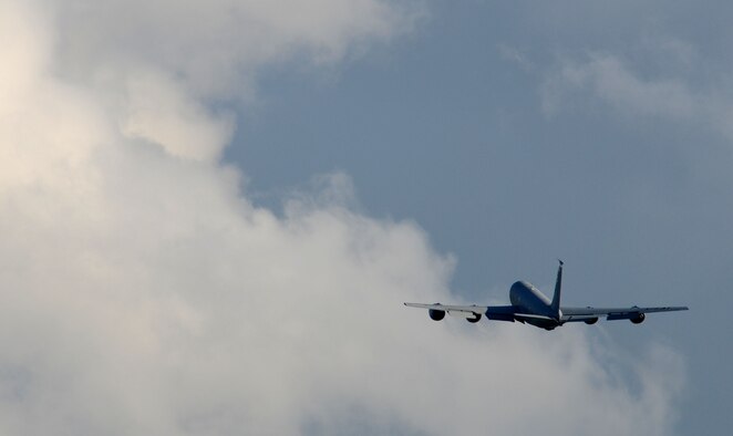 A KC-135 Stratotanker leaves RAF Mildenhall airspace Nov. 12, 2014, on RAF Mildenhall, England. Three tankers left RAF Mildenhall airspace together in a three-ship takeoff. (U.S. Air Force photo by Gina Randall/Released)