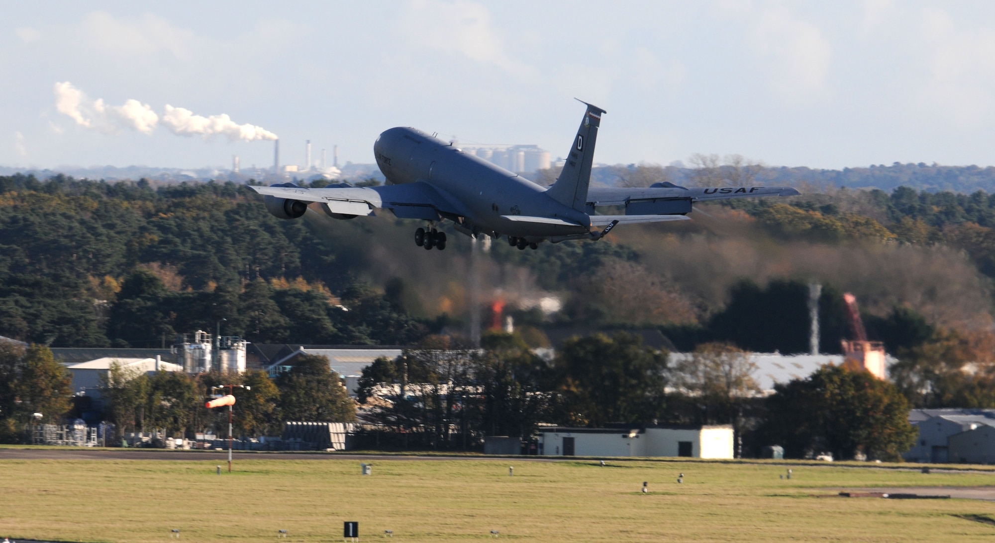 A KC-135 Stratotanker takes off Nov. 12, 2014, on RAF Mildenhall, England. Three tankers left RAF Mildenhall airspace together in a three-ship takeoff formation. (U.S. Air Force photo by Gina Randall/Released)