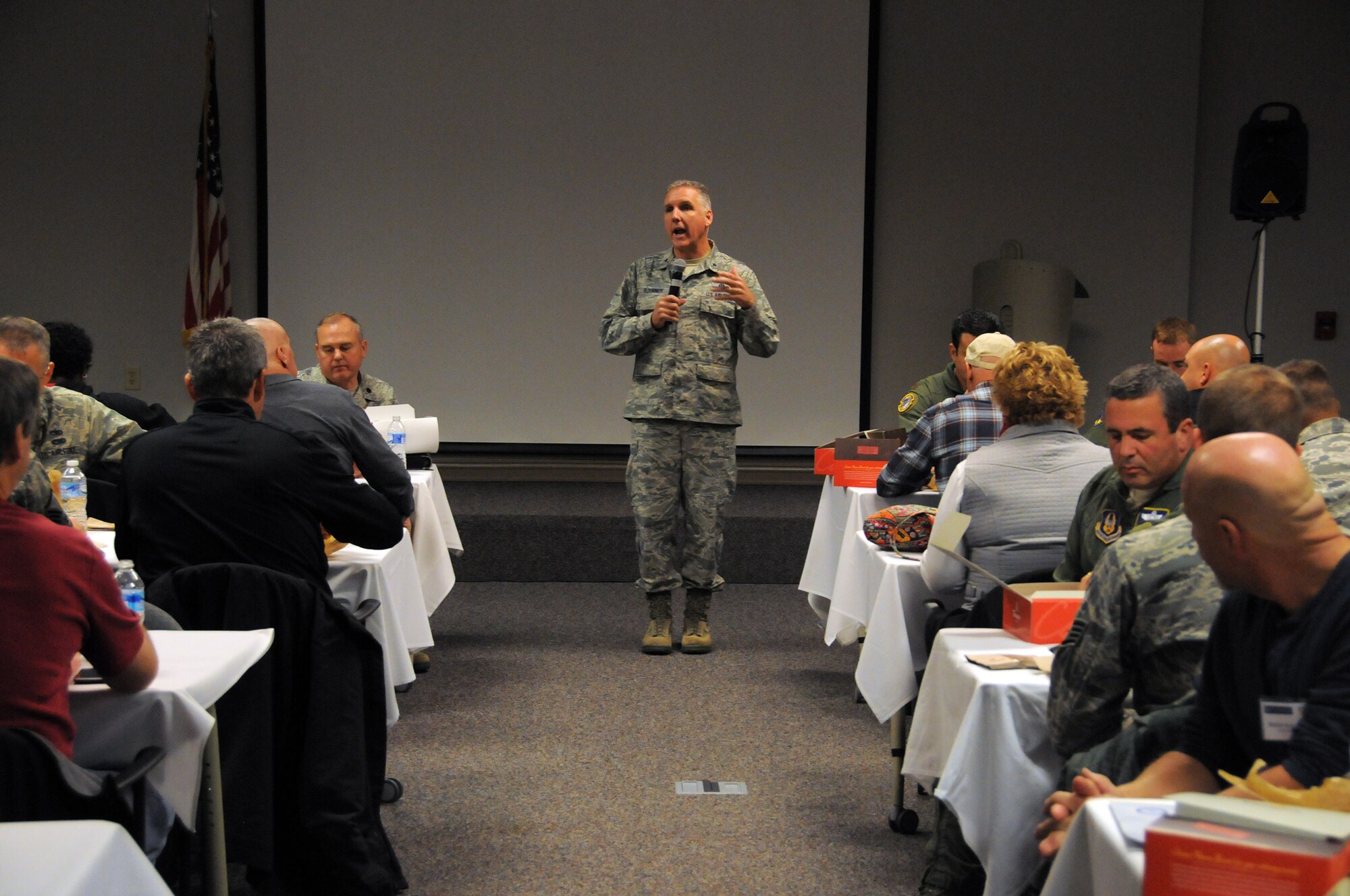 WRIGHT-PATTERSON AIR FORCE BASE, Ohio – Brig. Gen. John C. Flournoy Jr., Commander, Fourth Air Force, Air Force Reserve Command, March Air Reserve Base, California, speaks to participants of the 445th Airlift Wing Employer Appreciation Day Nov. 1, 2014. The general and Chief Master Sgt. Brian C. L. Wong, Fourth Air Force Command Chief Master Sergeant, met with the men and women of the 445th while visiting the wing Oct. 31-Nov. 2. The two not only visited with Airmen in their units, they also served lunch to wing Airmen at the Pitsenbarger Dining Facility. (U.S. Air Force photo/Tech. Sgt. Anthony Springer)