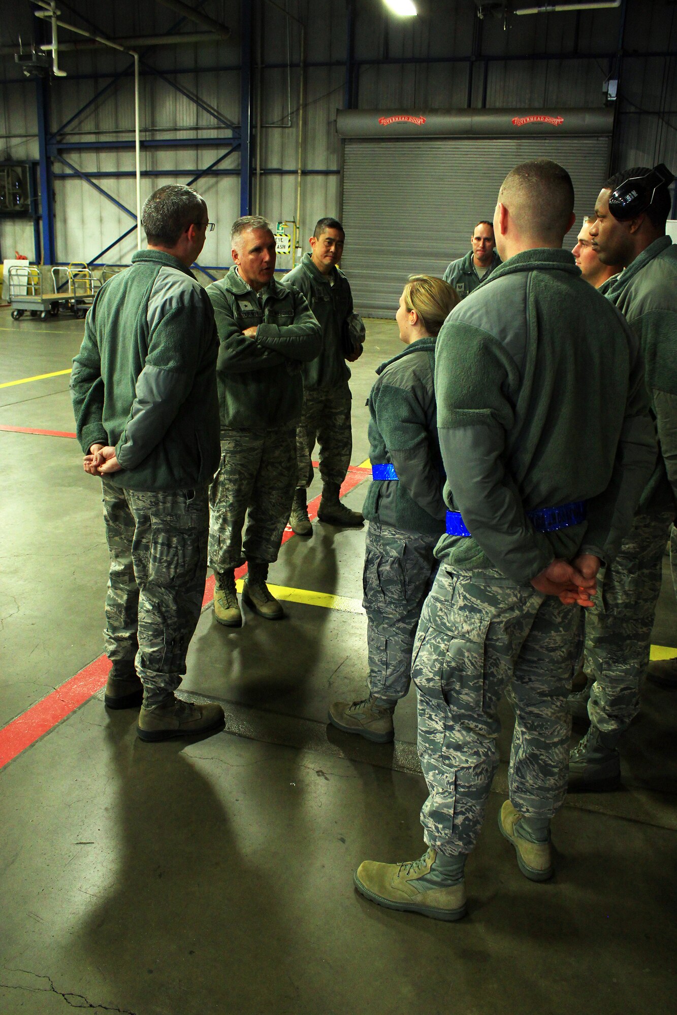 WRIGHT-PATTERSON AIR FORCE BASE, Ohio –Brig. Gen. John C. Flournoy Jr., Fourth Air Force Commander, and Chief Master Sgt. Brian C. L. Wong, Command Chief Master Sergeant, Fourth Air Force, March Air Reserve Base, California, visit with Airmen assigned to the 87th Aerial Port Squadron Nov. 1 during their visit to the 445th Airlift Wing Oct. 30-Nov. 2, 2014. While here, the general and command chief not only visited various units at the 445th, they also met with attendees of the wing’s Employer Appreciation Day and served lunch to wing Airmen at the Pitsenbarger Dining Facility. (U.S. Air Force photo/Tech. Sgt. Patrick O’Reilly)