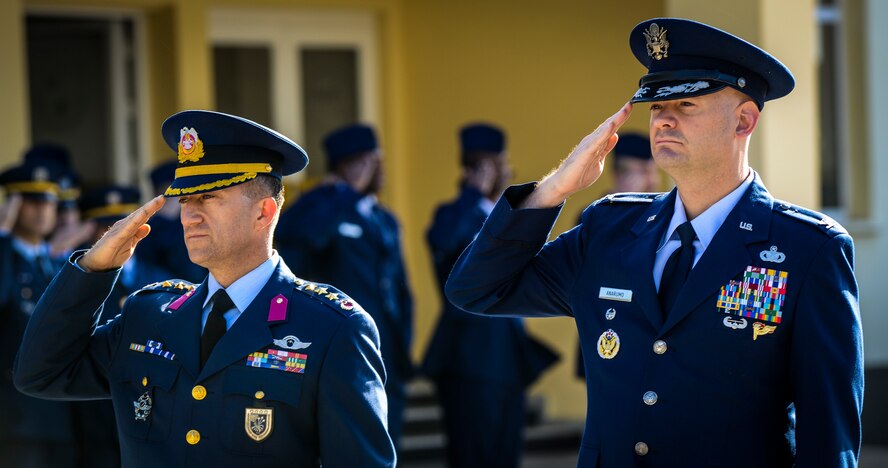 U.S. Air Force Col. Mark Anarumo, 39th Air Base Wing vice commander, (right), and Turkish Air Force Col. Kemal Turan, 10th Tanker Command chief of operations, (left), salutes a monument of Mustafa Kemal Ataturk during the Ataturk Memorial Day ceremony Nov. 10, 2014, Incirlik Air Base, Turkey. The Turkish AF invited U.S. AF personnel to join them in honoring Mustafa Kemal Ataturk, founder of the Republic of Turkey. (U.S. Air Force photo by Airman Cory W. Bush/Released) 