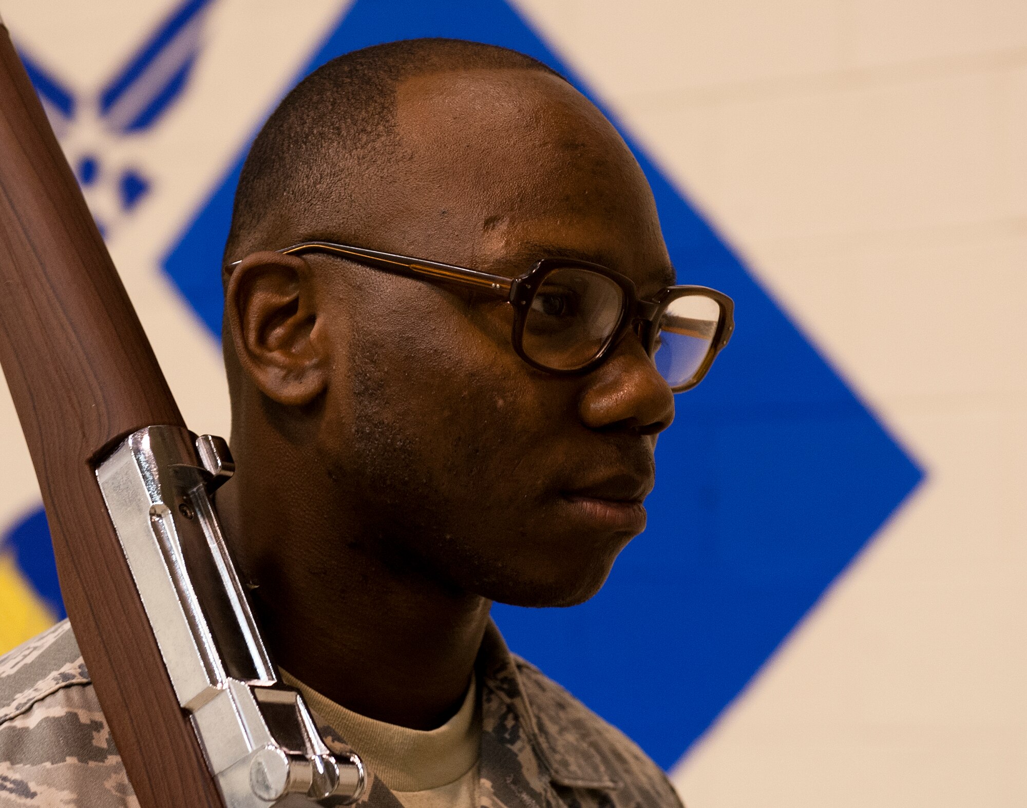 Staff Sgt. Monteco Perry, 65th Air Base Wing Honor Guard non-commissioned officer in charge marches during practice at Lajes Field, Azores, Portugal, Nov. 13, 2014. A ceremonial guardsman is an individual of good reputation, having integrity, ethical conduct and exhibiting standards which merit respect; responsible for protecting and overseeing the maintenance of standards on and off duty. (U.S. Air Force photo/Staff Sgt. Zachary Wolf/Released)