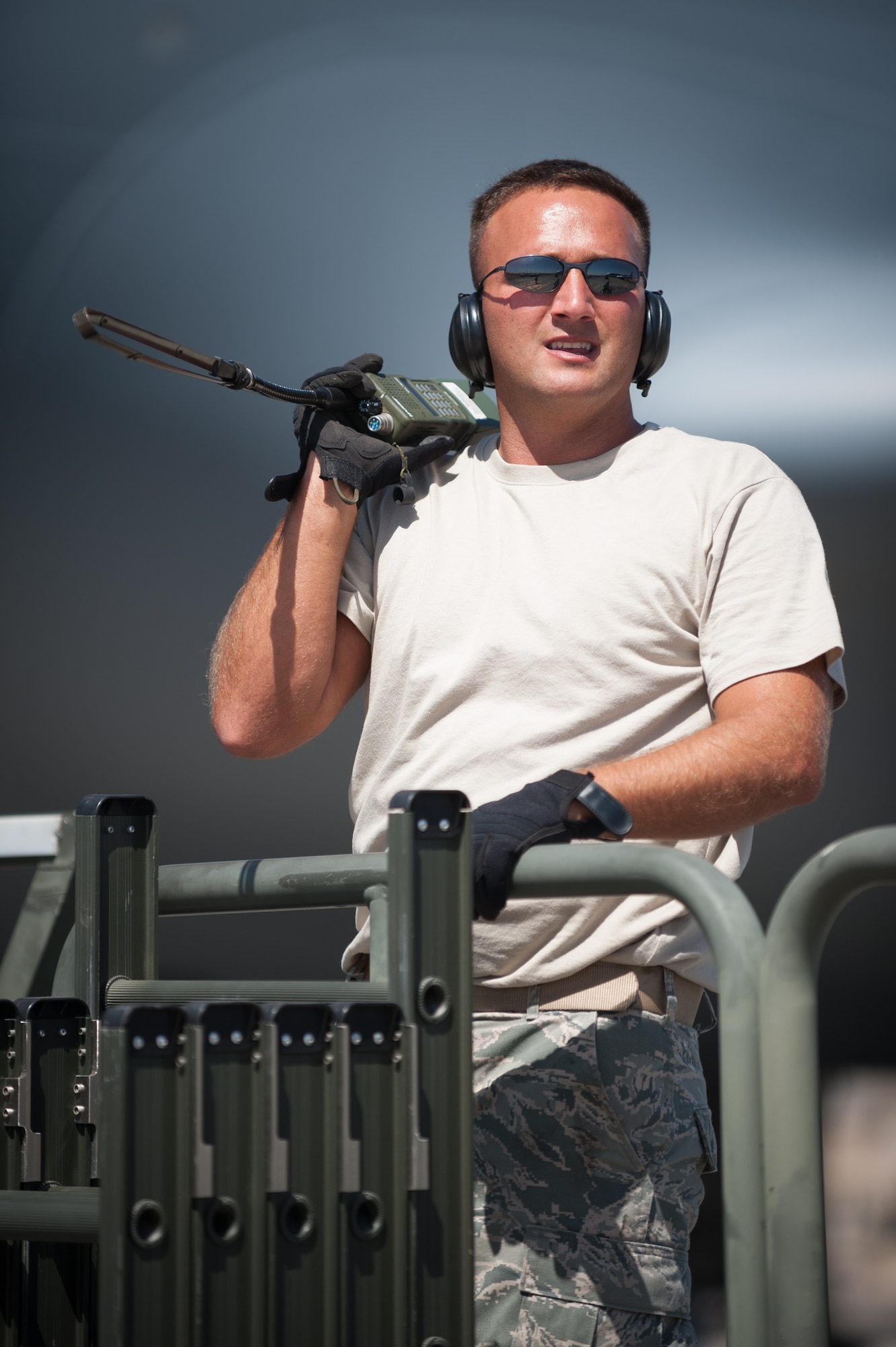 U.S. Air Force Tech. Sgt. Brian Leach, an aerial porter from the Kentucky Air National Guard’s 123rd Contingency Response Group, directs the offloading of humanitarian cargo from a U.S. Air Force KC-10 aircraft at Léopold Sédar Senghor International Airport in Dakar, Senegal, Nov. 12, 2014. The cargo will be staged in Senegal before being transloaded to U.S. Air Force C-130J aircraft for delivery into Monrovia, Liberia, in support of Operation United Assistance, the U.S. Agency for International Development-led, whole-of-government effort to contain the Ebola virus outbreak in West Africa. (U.S. Air National Guard photo by Maj. Dale Greer)
