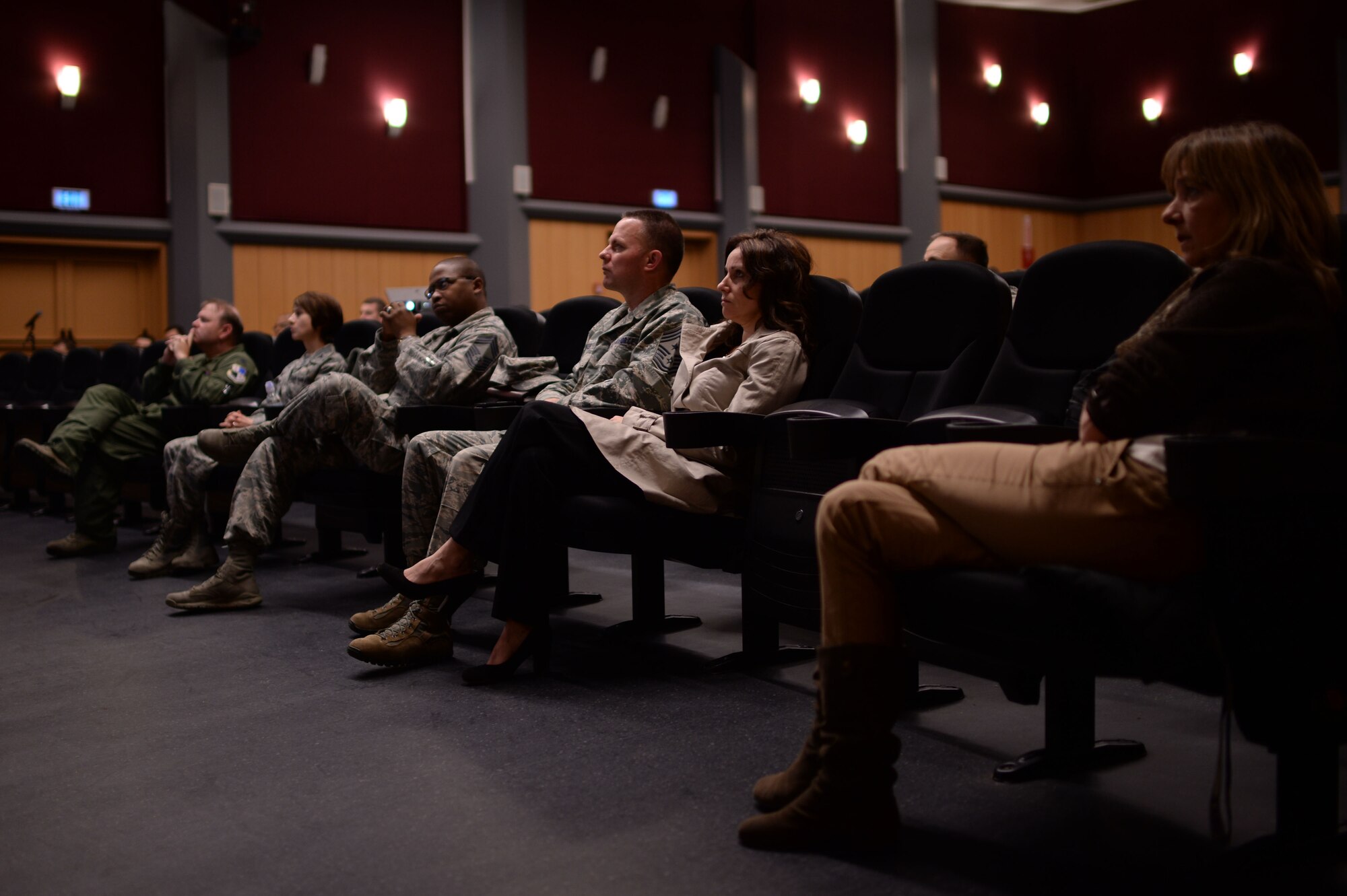 Members of the Spangdahlem community listen to a briefing about the Ebola virus disease, or EVD, at the theater Nov. 13, 2014, at Spangdahlem Air Base, Germany. The 52nd Medical Group hosted the information forum to address public concerns and share the facts about Ebola. (U.S. Air Force photo by Staff Sgt. Daryl Knee/Released)