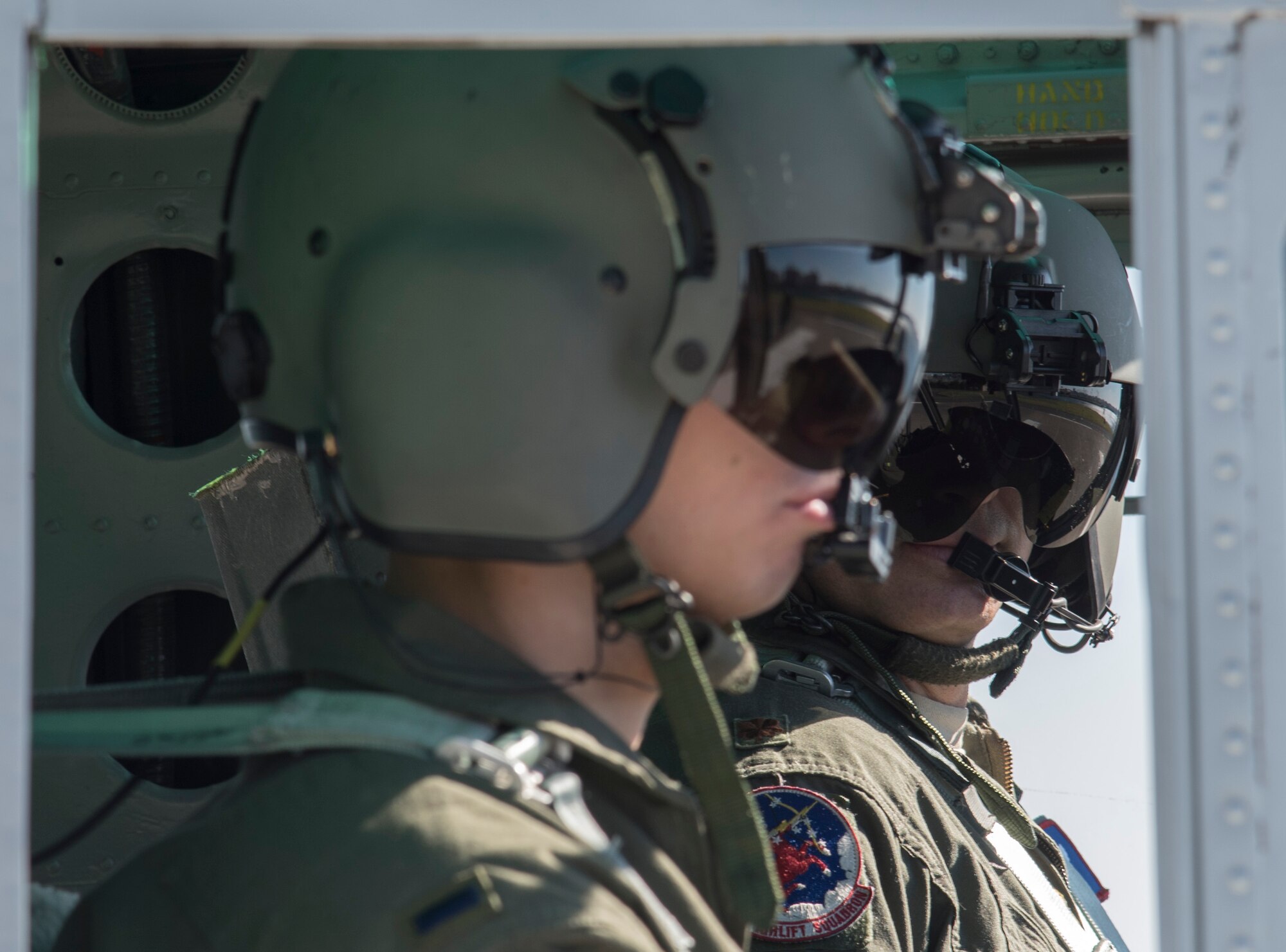 Maj. Destry Hill and 1st Lt. Daniel Trapani, 459th Airlift Squadron pilots, man the controls of a UH-1N Huey as they land at Yokosuka Naval Station during aeromedical evacuation training for Exercise Keen Sword 2015 at Yokota Air Base, Japan, Nov. 13, 2014. Keen Sword 2015 is a joint and bilateral exercise aimed at improving military readiness and strengthening the Japanese-U.S. alliance. (U.S. Air Force photo by Senior Airman Michael Washburn/Released)