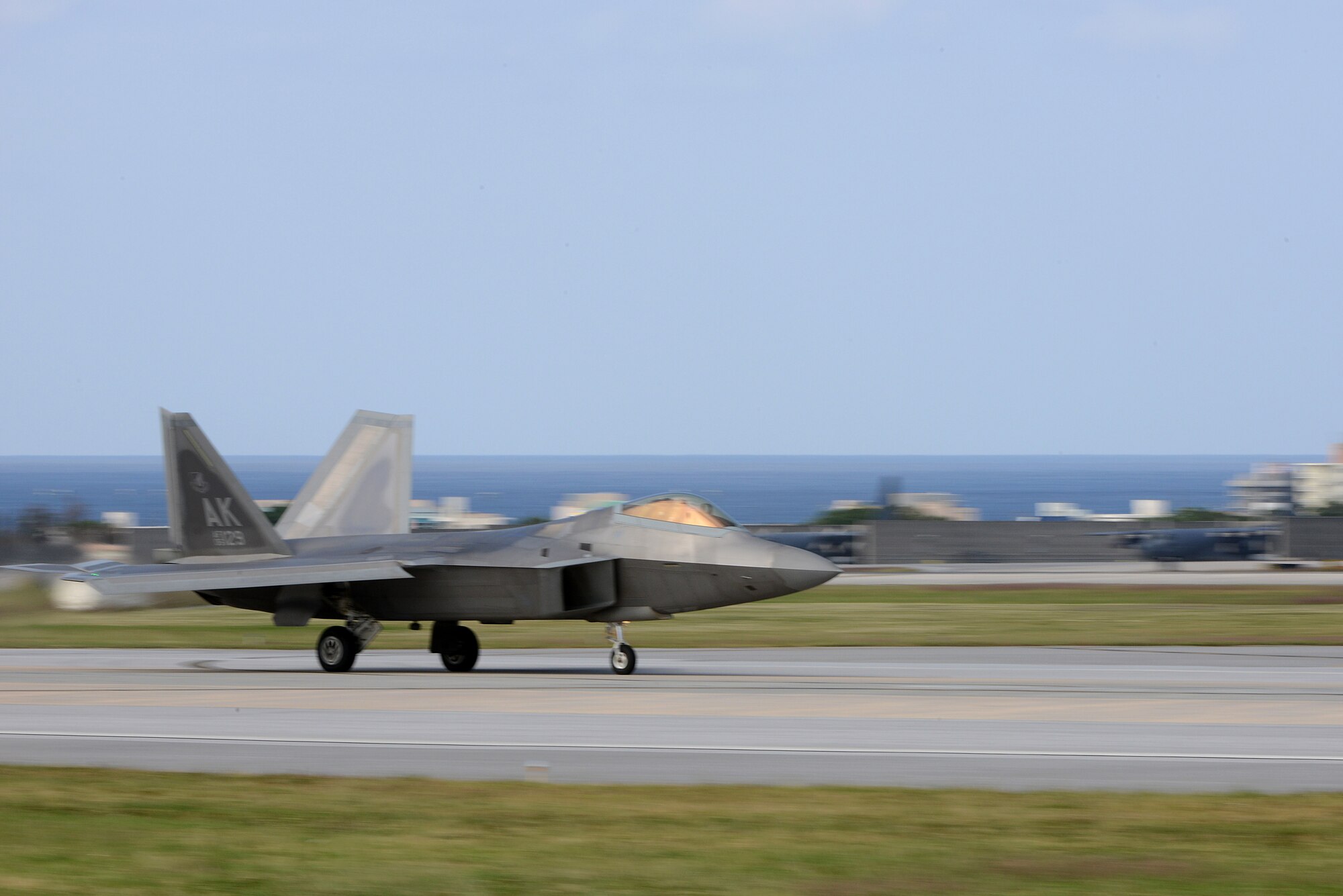A U.S. Air Force F-22 Raptor from the 525th Fighter Squadron stationed at Joint Base Elmendorf-Richardson, Alaska, lands on the Kadena Air Base, Japan, runway during Keen Sword 2015 Nov. 14, 2014. Keen Sword is a regularly scheduled exercise which strengthens Japan-U.S. military interoperability and meets mutual defense objectives. Japan-U.S. military operations and exercises increase readiness to respond to varied crisis situations in the region. (U.S. Air Force photo by Senior Airman Maeson L. Elleman/Released) 