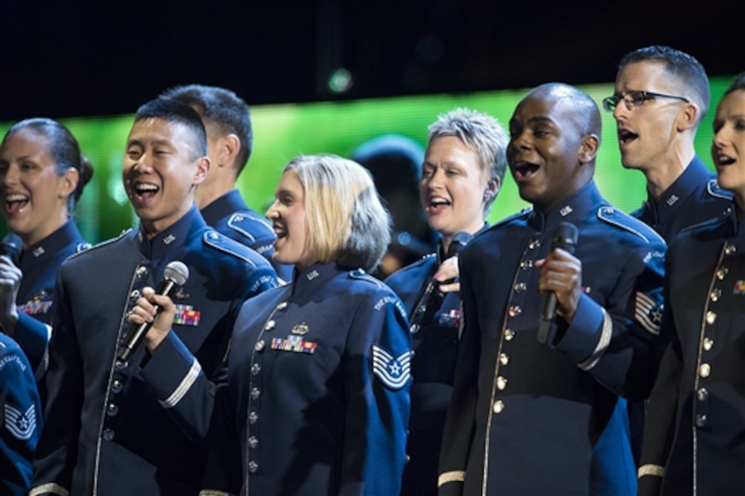 The U.S. Air Force Singing Sergeants provide chorus for country musician Carrie Underwood, not shown, during the Concert for Valor in Washington, D.C., Nov. 11, 2014. 
