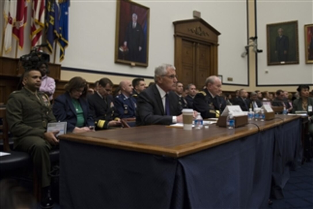 Defense Secretary Chuck Hagel testifies before the House Armed Services Committee on U.S. policy toward Iraq and the threat posed by the Islamic State of Iraq and the Levant in Washington, D.C., Nov. 13, 2014. Army Gen. Martin E. Dempsey, chairman of the Joint Chiefs of Staff, also testified. 