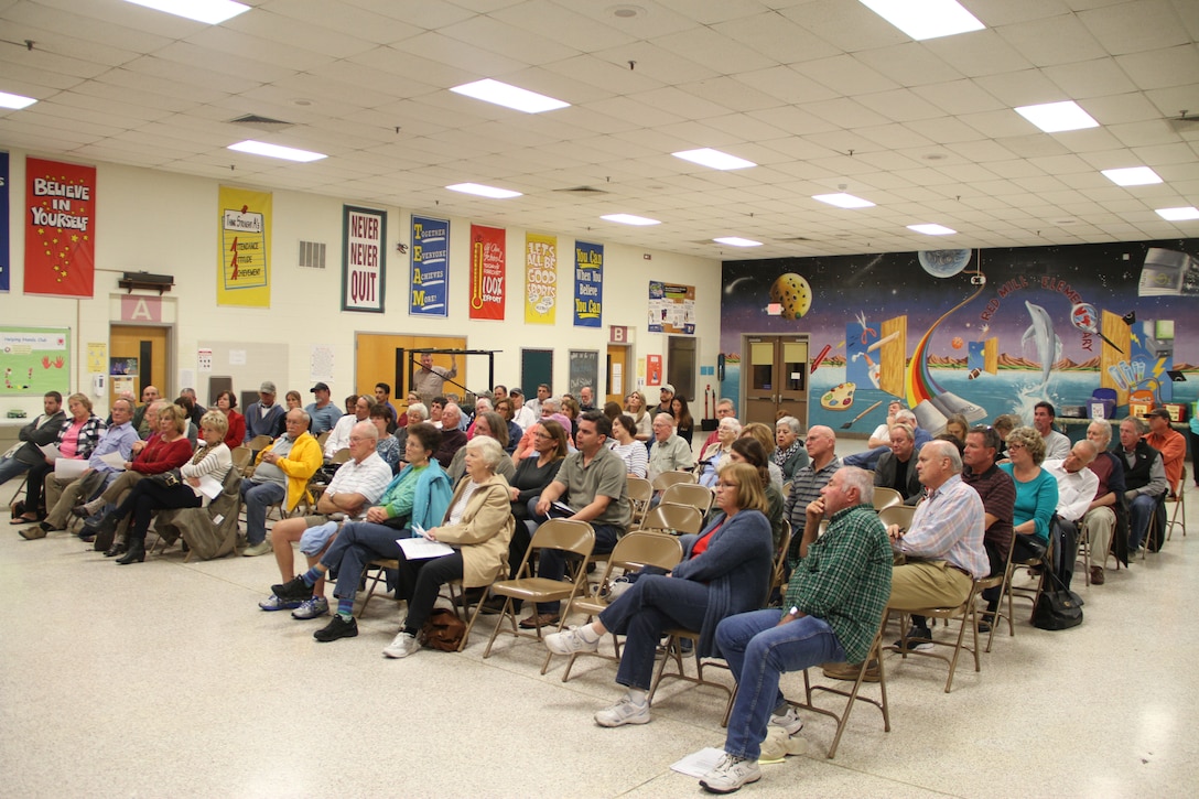 Red Mill Elementary School in Virginia Beach, Va., provided the venue Nov. 6, as more than 100 Sandbridge area community members voiced their concerns and opinions on the pending Environmental Impact Statement study for the proposed Wilkins’ Marina project. The scoping meeting, hosted by the Norfolk District, U.S. Army Corps of Engineers, sought to listen to community members and capture their comments for use in the development of the EIS.
After a lively and oftentimes passionate discussion during the meeting’s introductory session, led by Tom Walker, Norfolk District’s Regulatory chief, and Harold Jones, project consultant, community members were separated into four break-out sessions to focus on identifying, defining and capturing specific project issues. The break-out sessions were led by environmental scientists from the district’s Regulatory Branch and managed by Melissa Nash, the Corps’ Wilkins' Marina EIS project manager.
Community members were also informed of the 45-day comment period allowing them to send their comments to the Corps via email or mail through Nov. 21, 2014, and the creation of a Corps Wilkins’ Marina EIS project web page to keep community members updated.
