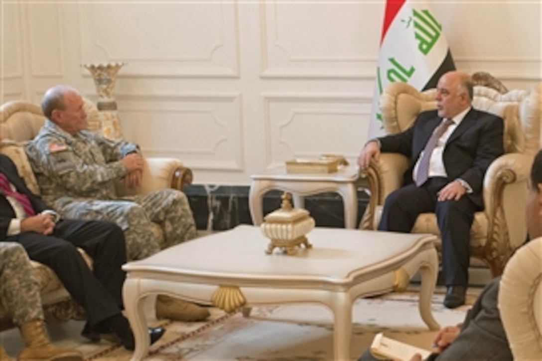 U.S. Army Gen. Martin E. Dempsey, chairman of the Joint Chiefs of Staff, meets with Iraqi Prime Minister Haider al-Abadi in Baghdad, Nov. 15, 2014. Dempsey discussed the progress and achievements of Iraqi Security Forces and the U.S.-led coalition in the fight against the Islamic State of Iraq and the Levant.