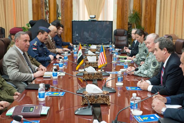 Shawkat B. Zebari meets with U.S. Chairman of the Joint Chiefs of Staff, Army Gen. Martin E. Dempsey at the Ministry of Defense in Baghdad, Iraq, Nov. 15, 2014. Dempsey visited Erbil to discuss the progress and achievements of Iraqi Security Forces and the U.S.-led coalition in the fight against ISIL.