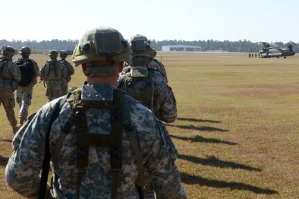 Soldiers from the South Carolina Army National Guard's 2nd Battalion, 218th Infantry Brigade line up to board a CH-47 Chinook at McEntire Joint National Guard Base, South Carolina, to participate in Carolina Thunder. 