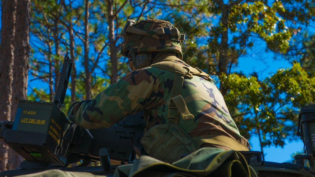 Royal Netherlands Korps Mariniers wait for orders to assault a combat town in Marine Corps Base Camp Lejeune, North Carolina on Nov. 7, 2014. This was one of the many training events of Bold Alligator 2014. A large-scale amphibious exercise on the East Coast designed to improve U.S. and allied forces response to a myriad of different crises.