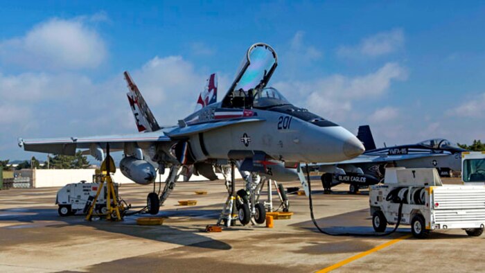 An F/A-18 hornet with Marine Fighter Attack Squadron 115 awaits maintenance during Exercise Max Thunder 14-2, aboard Kunsan Air Base, Republic Of Korea, Nov. 14, 2014. Max Thunder is a semi-annual training event consisting of composite and coalition flight training between the U.S. military and the ROK Force with a main focus on air combat tactics, close air support, and combat search and rescue.