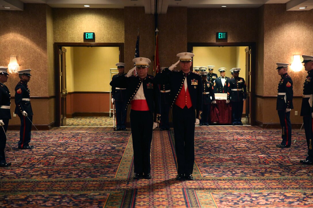 Col. John A. Bolt, (left), the commanding officer for the 4th Marine Corps District, and Maj. Gen. William D. Beydler, (right), the commanding general for the II Marine Expeditionary Force and United States Marine Corps Forces Africa, salute during the 239th Marine Corps ball in Harrisburg, Pennsylvania, Nov. 8, 2014. Marines all over the world gather each year for the ball to celebrate the founding of the Marine Corps in Tun Tavern, Philadelphia, Pennsylvania, Nov. 10, 1775. 