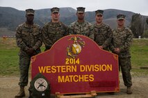 The Headquarters and Headquarters Squadron rifle team, based out of Marine Corps Air Station Yuma, Ariz., poses for their team photo after the conclusion of the Competition-In-Arms Program Western Divisional at Wilcox Range aboard Marine Corps Base Camp Pendleton, Calif., March 6.