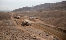 Marines with Marine Wing Support 371, based in Marine Corps Air Station Yuma, Ariz., and 7th Engineer Support Battalion, based in Marine Corps Base Camp Pendleton, Calif., take part in the West Desert El Centro All Weather Road Improvements at the U.S./Mexico Border in El Centro, Calif., Feb. 25.