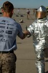 Aircraft Rescue and Fire Fighting Marines take part in the gear dash race during the 3rd Annual ARFF Rodeo Competition at Marine Corps Air Station Yuma, Ariz., Saturday. Teams that participated came from the firefighting units of MCAS Yuma, MCAS Miramar, Calif., and Marine Corps Base Camp Pendleton, Calif.