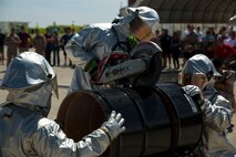 Aircraft Rescue and Fire Fighting Marines saw through a barrel as part of the 3rd Annual ARFF Rodeo Competition at Marine Corps Air Station Yuma, Ariz., Saturday. This year Marine Corps Base Camp Pendleton finished first place for the third consecutive year. MCAS Yuma took second and MCAS Miramar placed third. 
