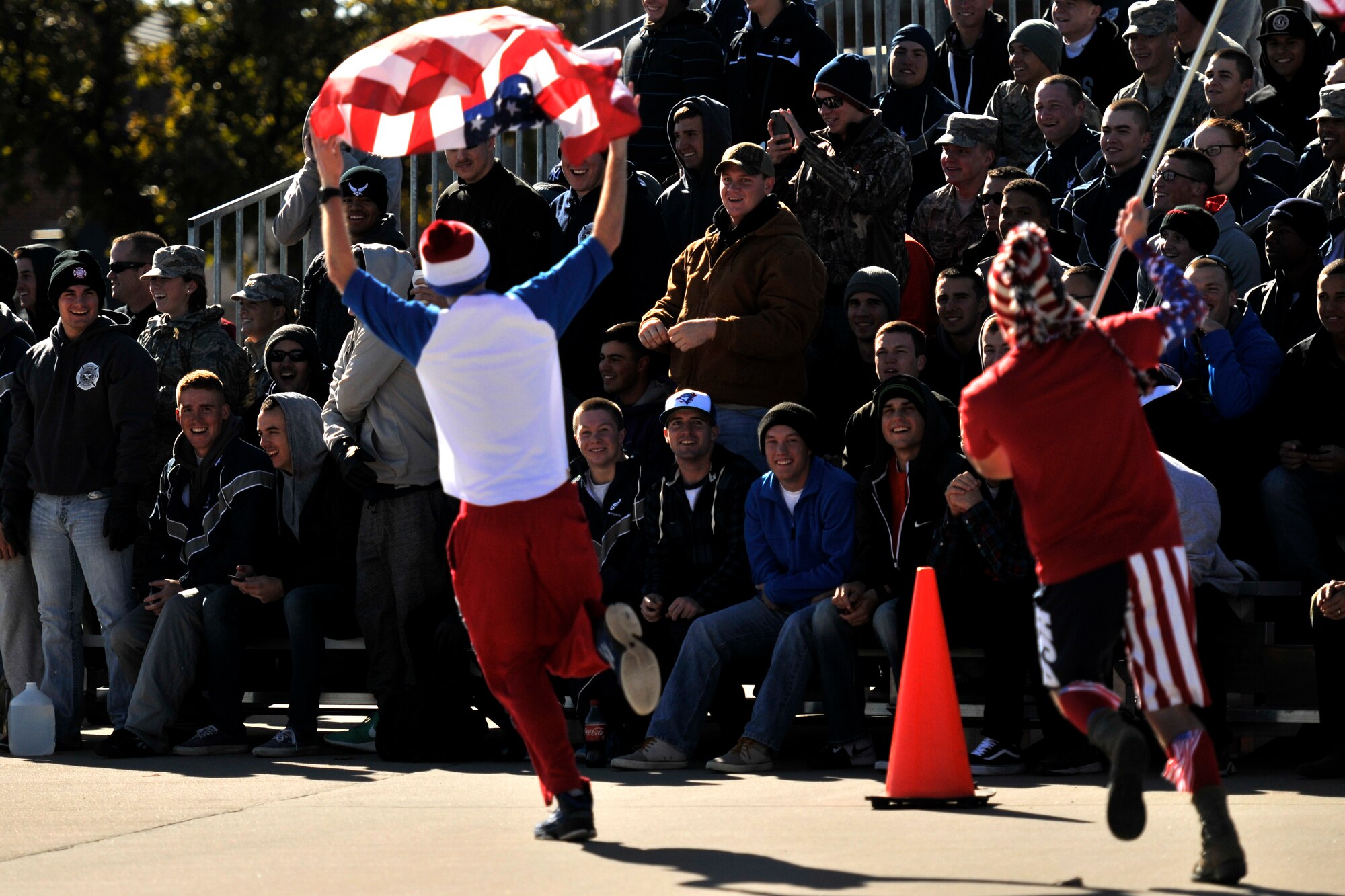 GOODFELLOW AIR FORCE BASE, Texas – Airmen of the 312th Training Squadron motivate their wingmen to cheer on their team for the drill competition during Community Appreciation Day at the Louis F. Garland Department of Defense Fire Academy Nov. 15. The 312th TRS won the competition. (U.S. Air Force photo/ Airman 1st Class Scott Jackson)