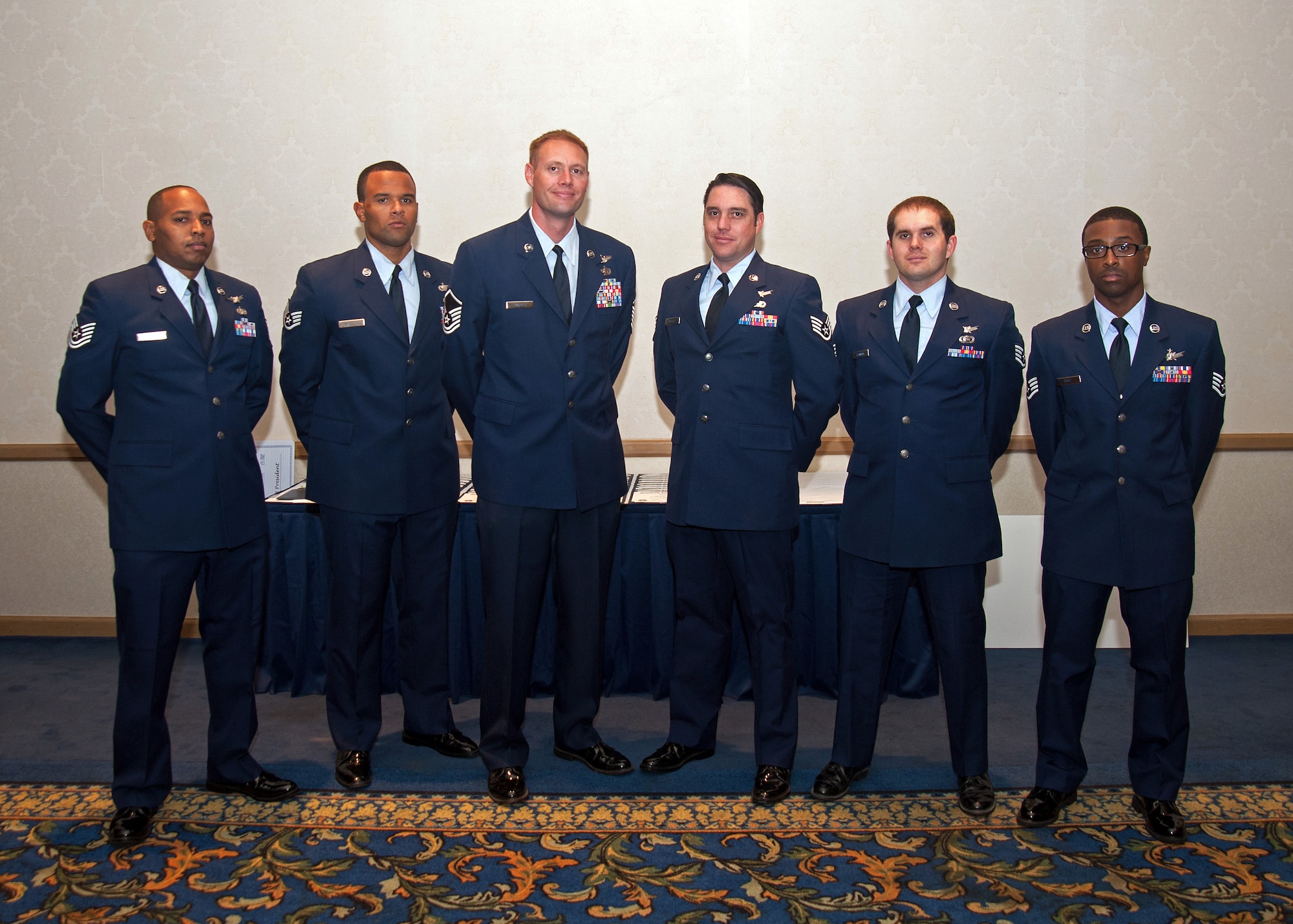 Airmen from 14th Air Force and the 614th Air Operations Center received their Community College of the Air Force diplomas during a graduation ceremony at Vandenberg AFB, Calif., Nov. 14, 2014.  Shown left to right are Tech. Sgt. Darryl Payton, Staff Sgt. Christopher Wescott, Master Sgt. Paul Allies, Staff Sgt Adam Russell, Staff Sgt. Stephen Cannon, and Staff Sgt. Cameron Cruz.  Graduates not pictured are Staff Sgt. Samantha Sharpe, Master Sgt. Shawn Cassim, Staff Sgt. Brian Mangone, Staff Sgt. Cody Peters, Airman 1st Class Deshaun Hutchinson, Staff Sgt. Nathan Molinet, Staff Sgt. Arturo Aquilera, Master Sgt. Christopher Fehrm and Staff Sgt. Travis Zellars.  (U.S. Air Force photo by Michael Peterson/Released)