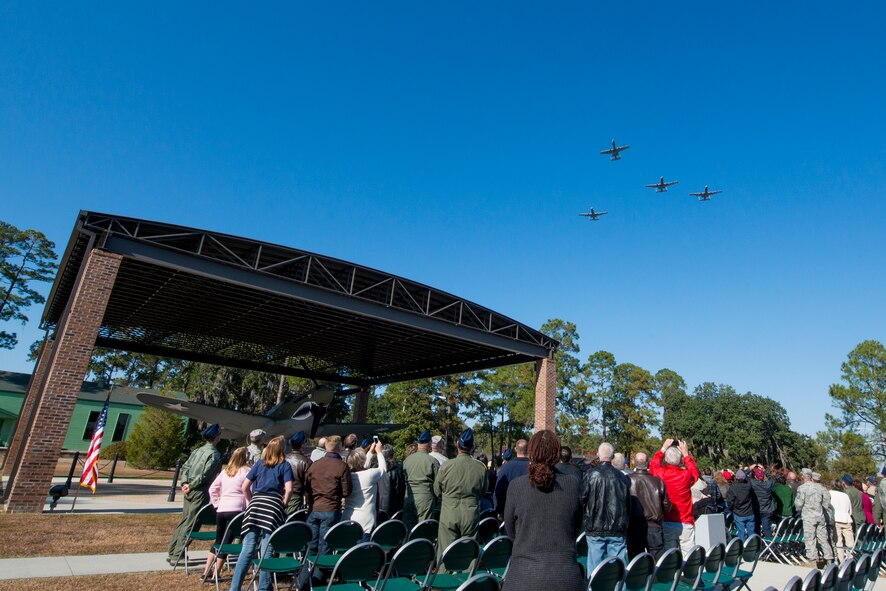 Four A-10C Thunderbolt II aircraft from the 23d Fighter Group perform a missing-man formation during the P-40 Warhawk pavilion dedication ceremony as part of the Flying Tiger Reunion Nov. 14, 2014, at Moody Air Force Base, Ga. The pavilion was dedicated to U.S. Air Force retired Lt. Col. Robert “Muck” Brown, an A-10 pilot and instructor who lost his battle to cancer this year. (U.S. Air Force photo by Airman 1st Class Ryan Callaghan/Released)