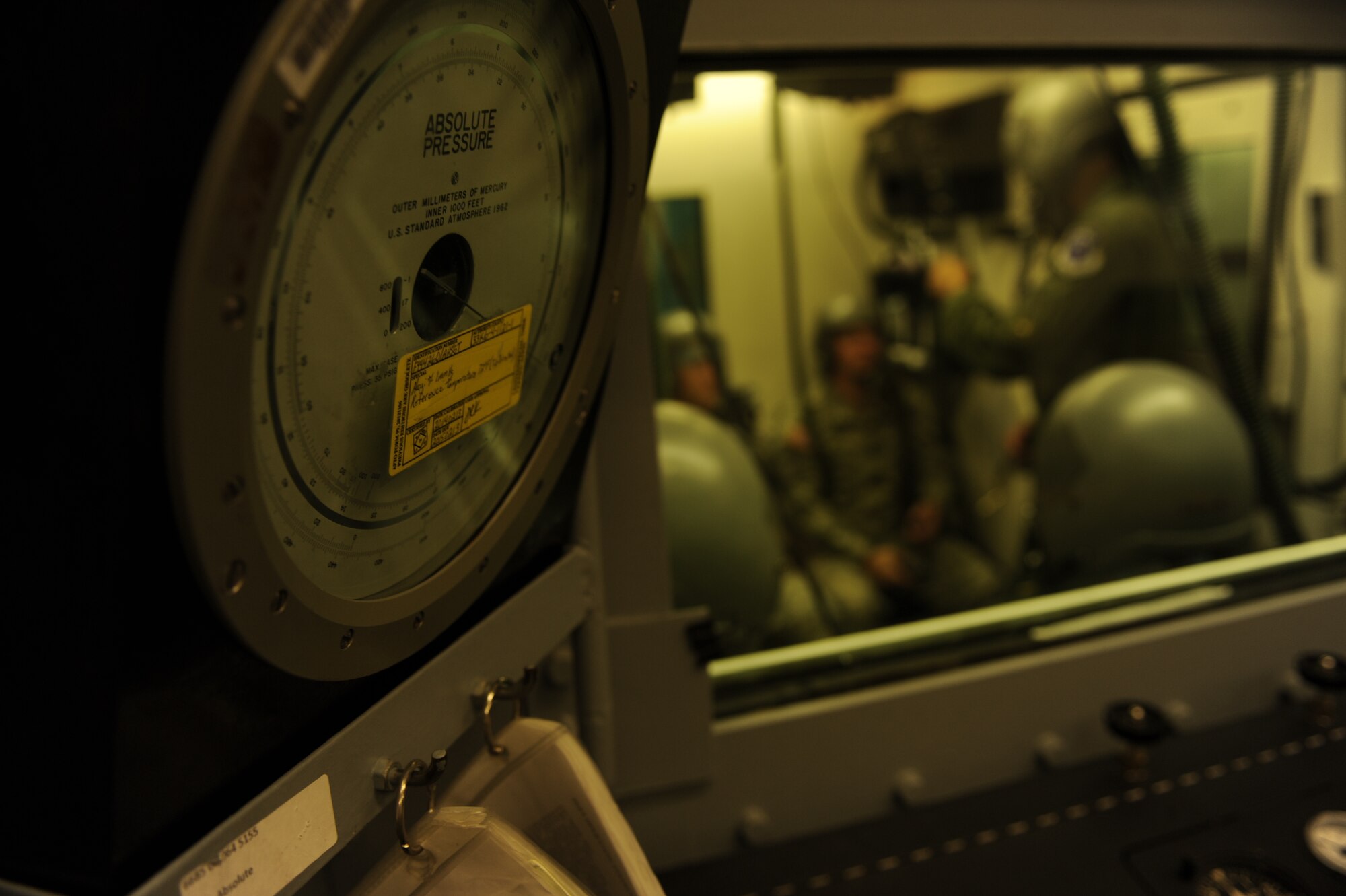 U.S. Army Rangers prepare to go through a rapid decompression test inside a hypobaric altitude chamber at Langley Air Force Base, Va., Nov. 14, 2014. The rapid decompression test simulates how it would feel if an aircraft window or door flew off in flight. (U.S. Air Force photo by Staff Sgt. Natasha Stannard/Released)