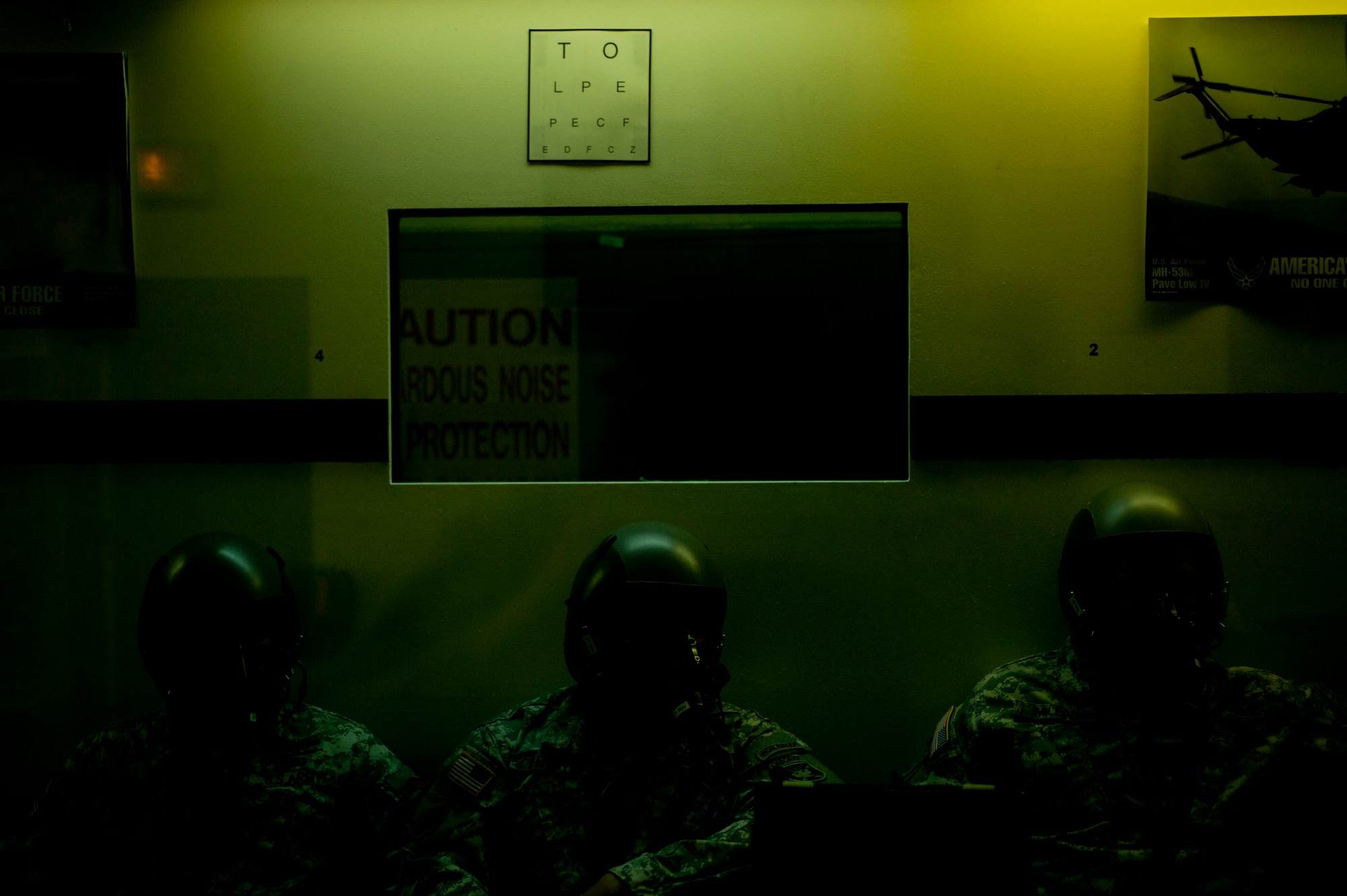 U.S. Army Rangers get used to breathing in their oxygen masks before going through a series of tests in a hypobaric altitude chamber at Langley Air Force Base, Va., Nov. 14, 2014. The chamber reduces pressure around students to create low pressure environments, which are experienced in high altitude.  (U.S. Air Force photo by Staff Sgt. Natasha Stannard/Released)