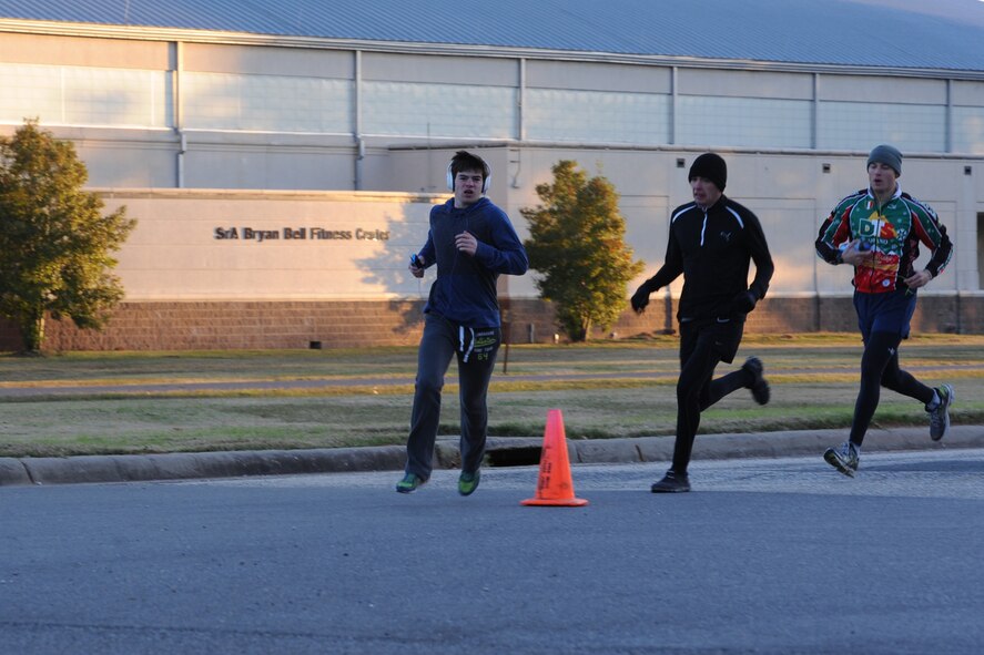 Airmen participate in the Turkey Trot 5K fun run on Barksdale Air Force Base, La., Nov. 14, 2014. The Senior Airman Bryan Bell Fitness Center hosted a Thanksgiving- themed 5K with turkey prizes in spirit of the upcoming holiday. (U.S. Air Force photo/ Senior Airman Jannelle Dickey)