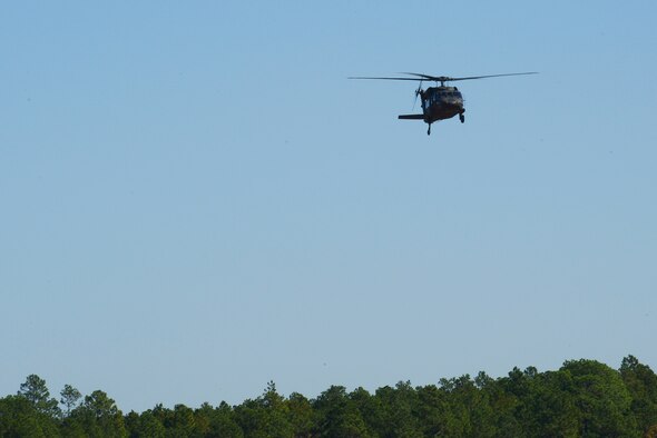 An U.S. Army National Guard UH-60 Blackhawk flies over Poinsett Electronic Combat Range, Sumter, S.C., Nov. 7, 2014. The range is used by the U.S. Air Force, U.S. Army, U.S. Marine Corps, South Carolina Air National Guard, South Carolina Army National Guard, and North Carolina Army National Guard. (U.S. Air Force photo by Airman 1st Class Diana M. Cossaboom/Released)