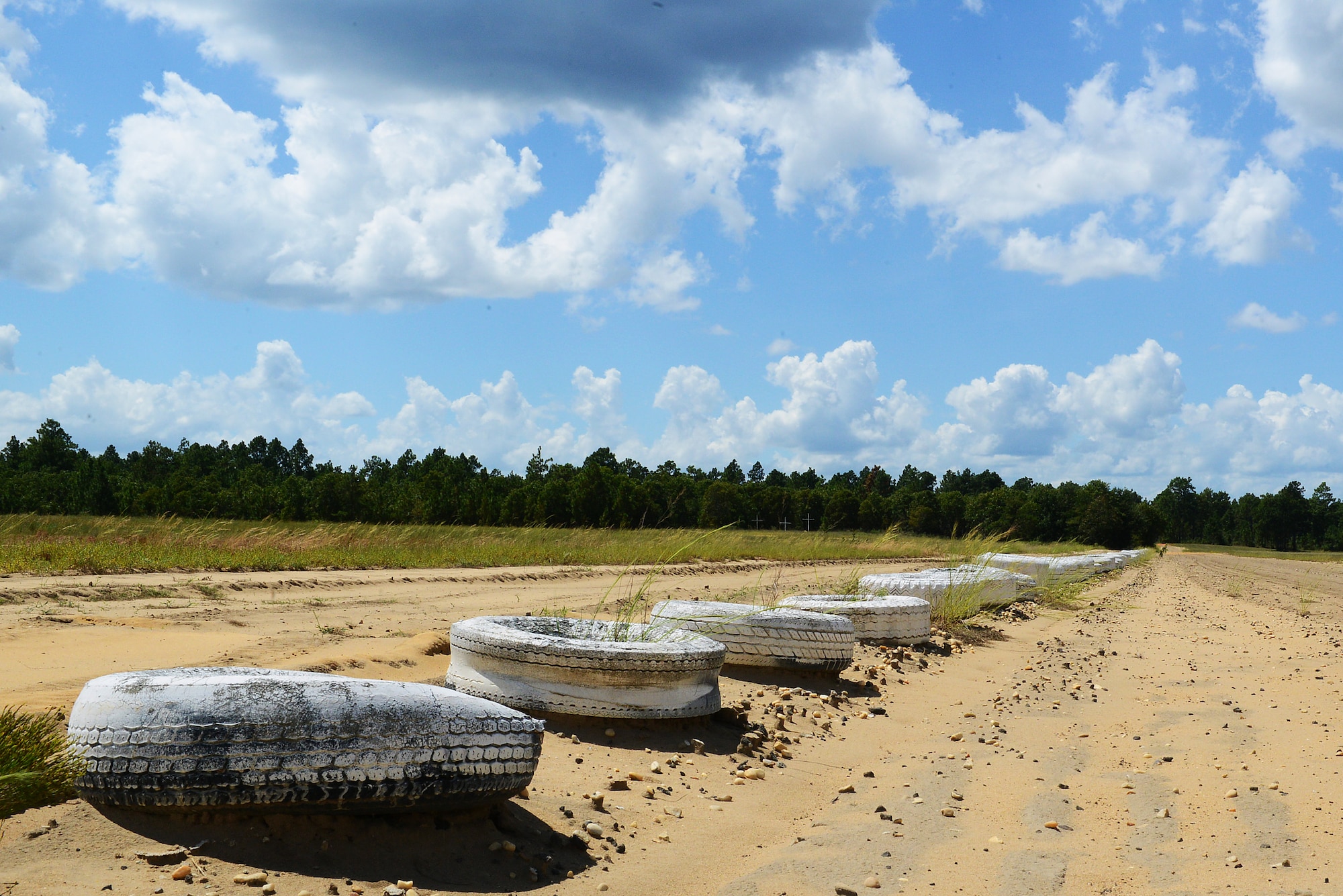 The white tire line at Poinsett Electronic Combat Range signifies when the pilots can start shooting their munitions in Sumter, S.C., Sept. 4, 2014. The range only supports munitions that aren’t live, which are then disposed of by explosive ordnance disposal Airmen. (U.S. Air Force photo by Airman 1st Class Diana M. Cossaboom/Released)