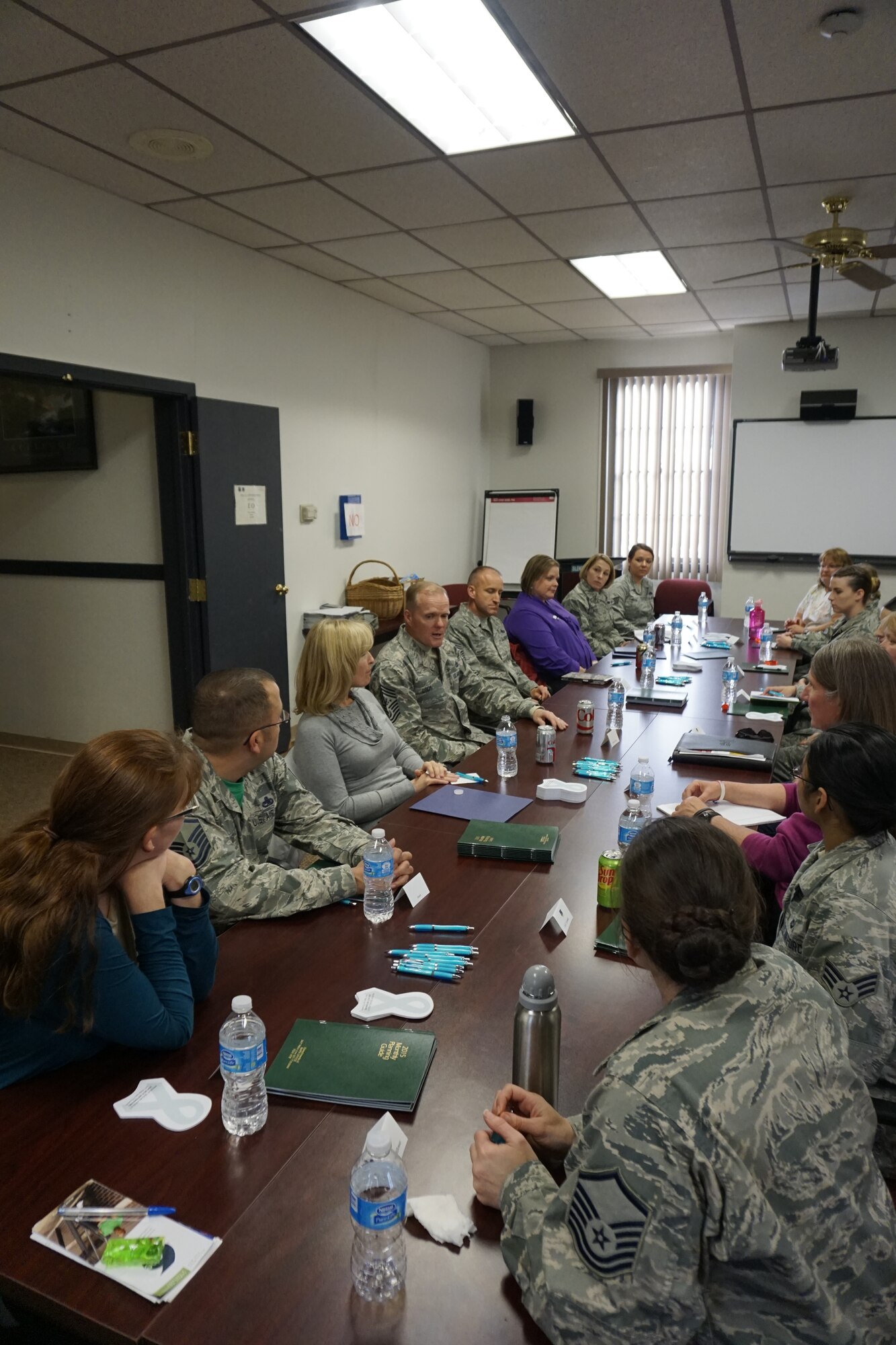 Chief Master Sgt. of the Air Force James Cody, Chief Master Sgt. (Ret.) Athena Cody and Chief Master Sgt. Melanie Noel, senior enlisted advisor for the Air Force SAPR office, meet with the sexual assault and prevention response team Nov. 14, 2014, at F.E. Warren Air Force Base, Wyo. The SAPR team consisted of Mary Brown, 90th Missile Wing Sexual Assault and Prevention Coordinator, and victim advocates from the 90th MW and the Wyoming National Guard and Reserve. (U.S. Air Force photo by Lan Kim)