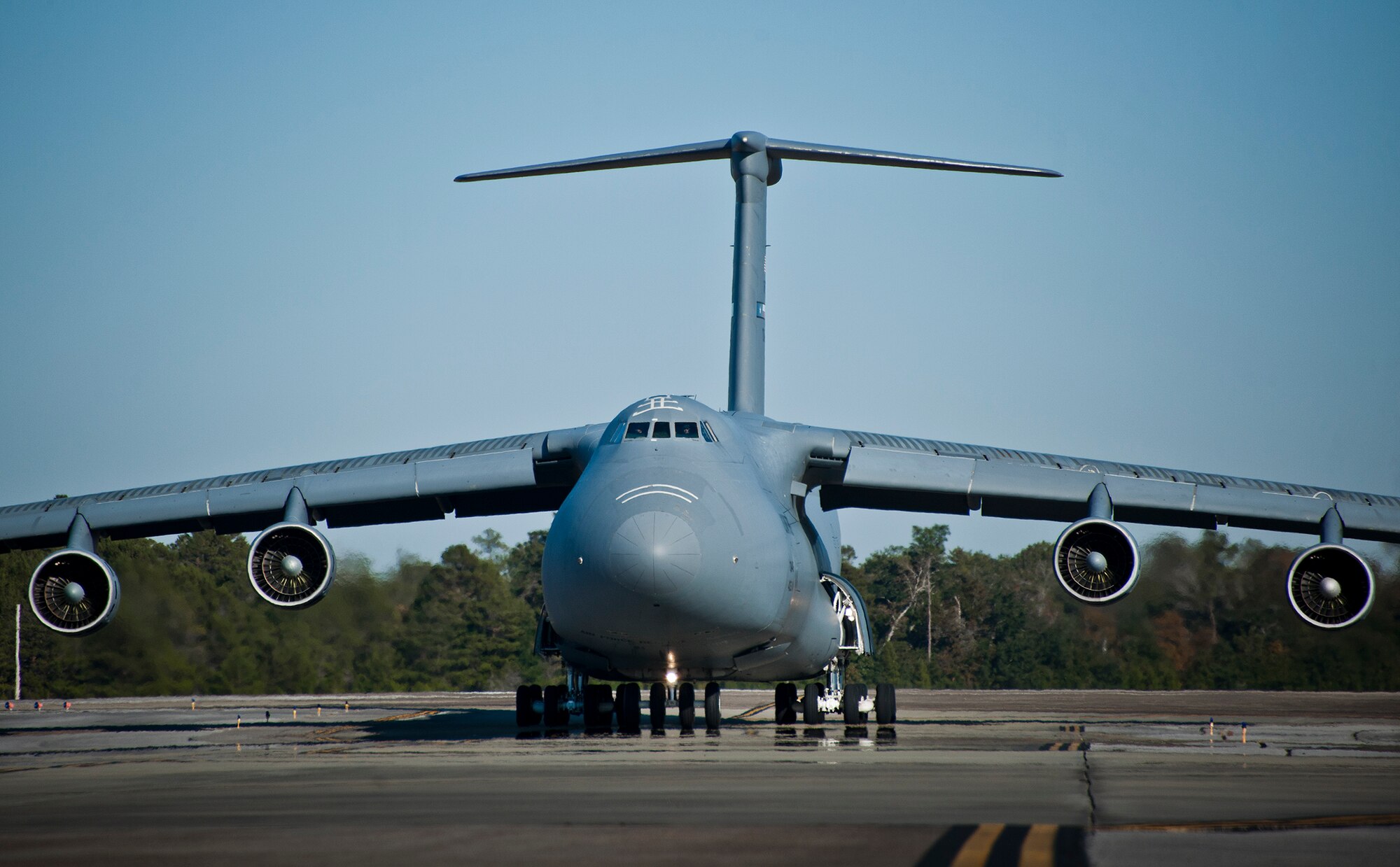 A 433rd Airlift Wing C-5 Galaxy from Joint Base San Antonio arrives with passengers and equipment to Eglin Air Force Base, Fla. Nov. 14.  The reserve aircrew brought home Soldiers and equipment from the Army’s 7th Special Forces Group.  (U.S. Air Force photo/Samuel King Jr.)