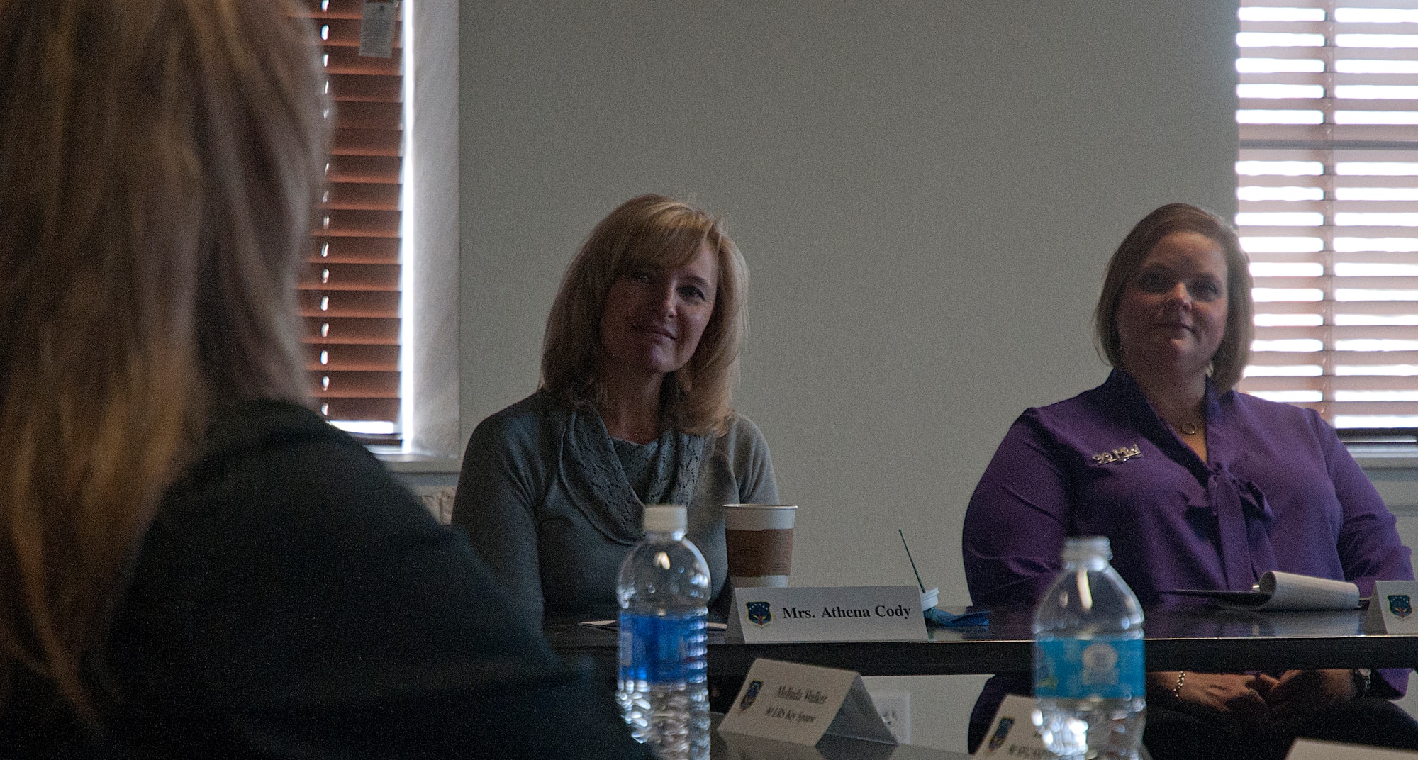 Chief Master Sgt. (Ret.) Athena Cody listens to members of the Warren Spouses Club during a visit to F.E. Warren Air Force Base, Wyo., Nov.14, 2014. Cody and her husband, Chief Master Sgt. of the Air Force James Cody, met with Airmen and their families over a period of two days and let them know their importance to the mission and the Air Force. (U.S. Air Force photo by Airman Malcolm Mayfield)