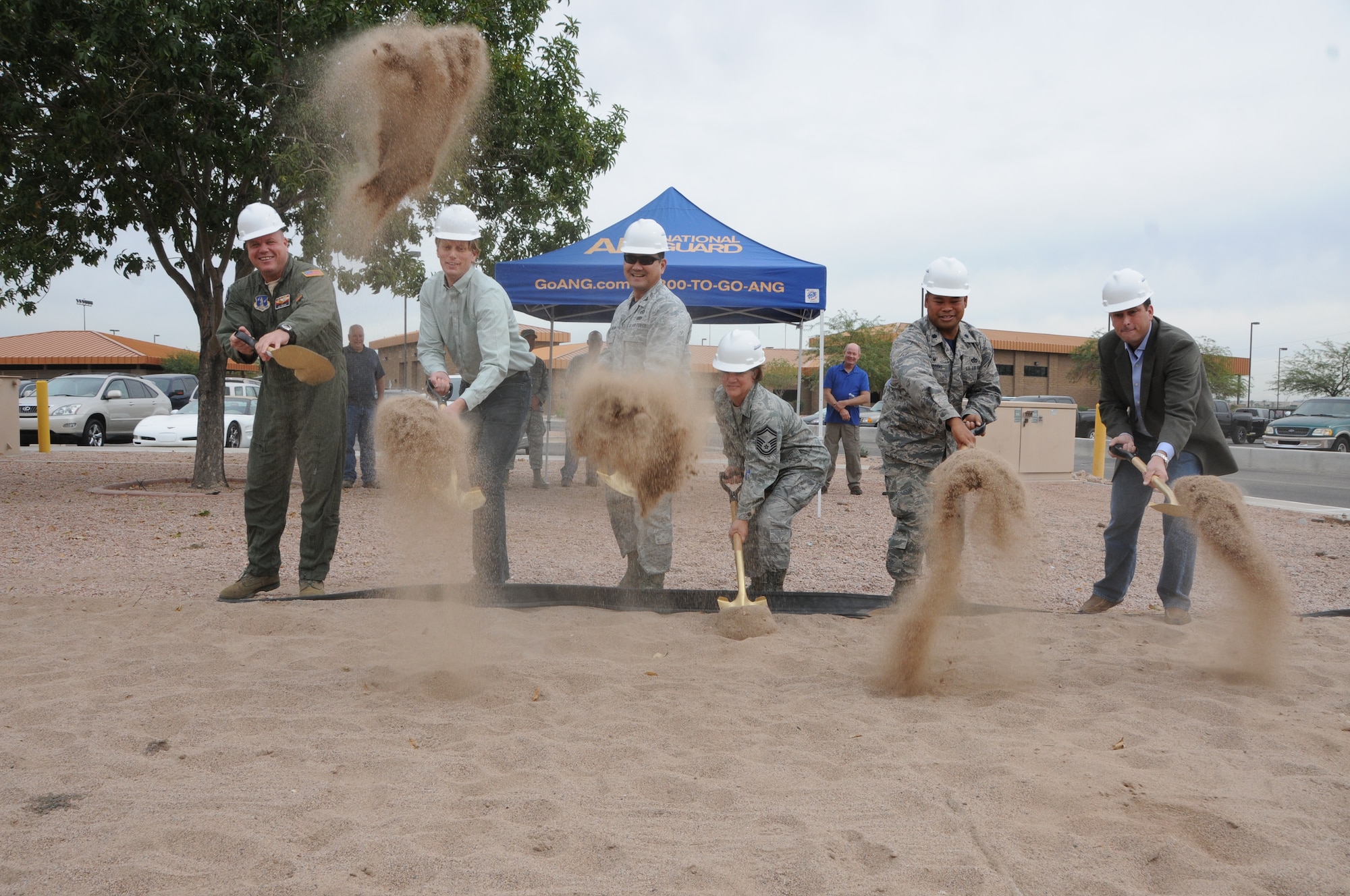 Col. Gary D. Brewer Jr, Commander 161st Air Refueling Wing, Brandon Carr, CEO Briston Construction, Col. Kyle Kobashigawa, Mission Support Group Commander, Senior Master Sgt. Kindra Sweet, Sustainment Flight Superintendent, Lt. Col. Eric Queddeng, Civil Engineering Squadron Commander and Daniel Briscoe, COO Briston Construction break ground for the new Base Fitness Center on Nov. 14 here at Phoenix Sky Harbor Air National Guard Base. The 2,400 square foot fitness center, which is scheduled to open in approximately six months, will provide Airmen twice the square footage of the existing facility, add daylighting features, industrial architecture finishes, 20 foot vaulted ceilings and reverse osmosis drinking water. (U. S. Air National Guard photo by Master Sgt. Kelly M. Deitloff/Released)