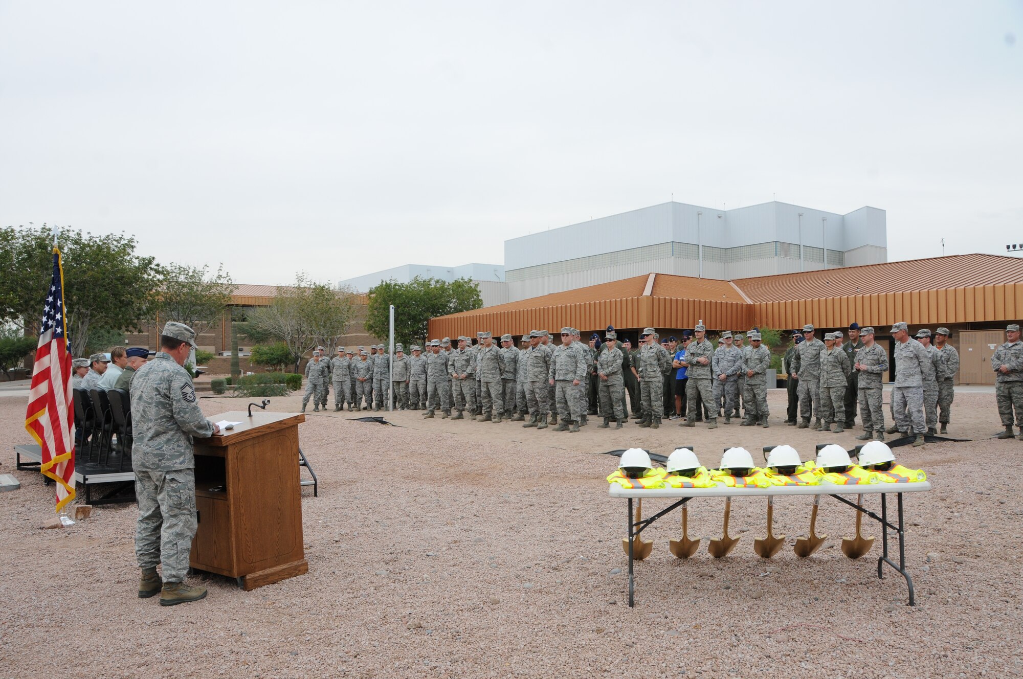 Airmen from the 161st Air Refueling Wing gather for a ground breaking ceremony for the Base Fitness Center, Nov.14 here at Phoenix Sky Harbor Air National Guard Base. The 2,400 square foot fitness center, which is scheduled to open in approximately six months, will provide Airmen twice the square footage of the existing facility, add daylighting features, industrial architecture finishes, 20 foot vaulted ceilings and reverse osmosis drinking water. (U. S. Air National Guard photo by Master Sgt. Kelly M. Deitloff/Released)