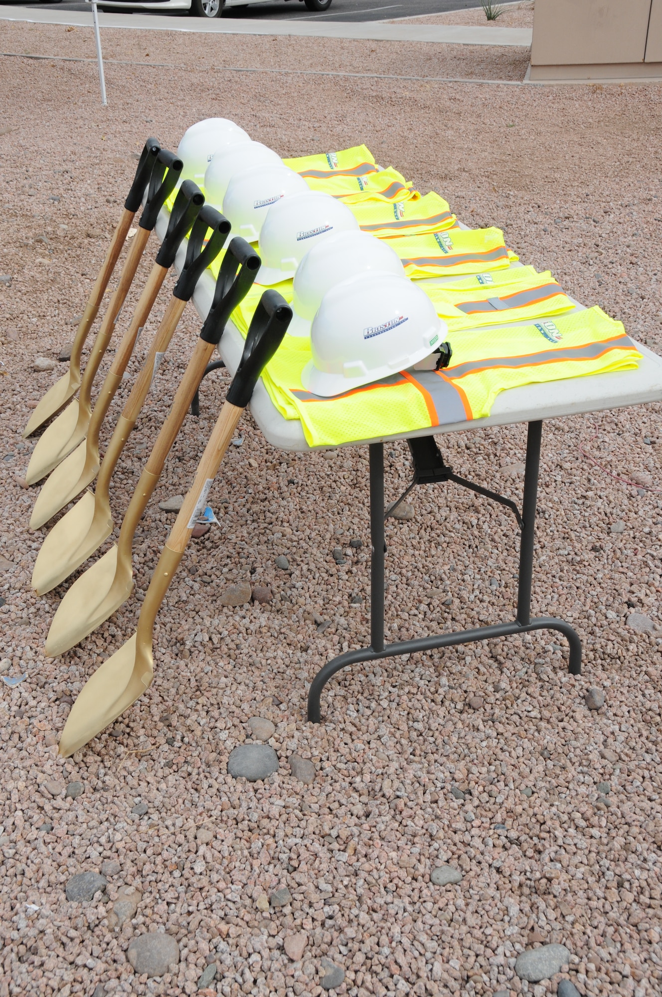 Six hard hats, gold shovels and safety vests are ready for the ground breaking ceremony for the new Base Fitness Center at Phoenix Sky Harbor Air National Guard Base Nov. 14, 2014. The 2,400 square foot fitness center, which is scheduled to open in approximately six months, will provide Airmen twice the square footage of the existing facility, add daylighting features, industrial architecture finishes, 20 foot vaulted ceilings and reverse osmosis drinking water. (U. S. Air National Guard photo by Master Sgt. Kelly M. Deitloff/Released)