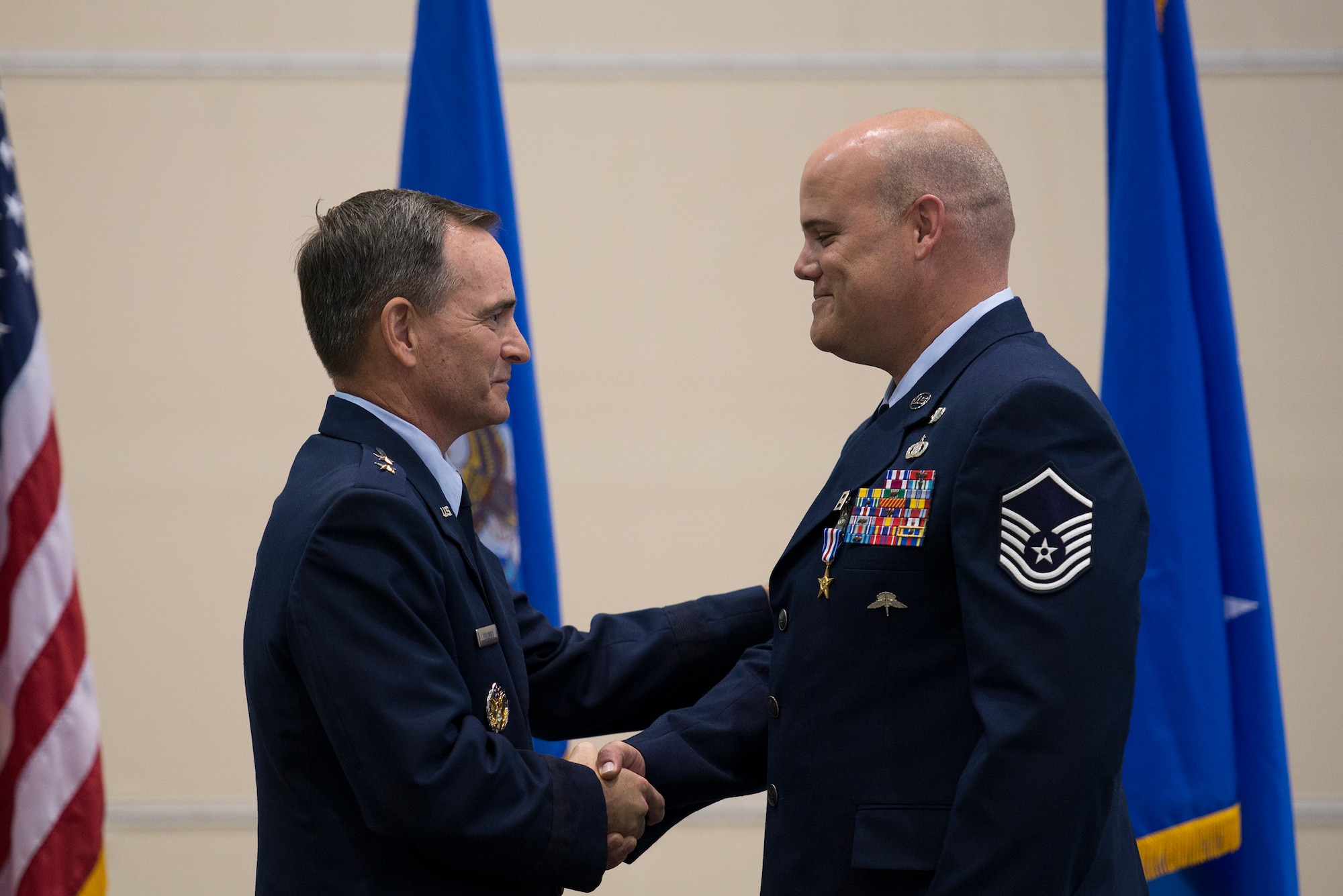 Maj. Gen. Harry Polumbo, the 9th Air Force Commander, presented Master Sgt. Thomas Case, a tactical air control party airman, 18th Air Support Operations Group, with his second Silver Star medal, Nov. 13, 2014 at Pope Army Airfield, N.C. Case received the medal for gallantry in action during a 2009 deployment to Afghanistan. The Silver Star Medal is the U.S. military’s third highest military decoration for valor. It is presented for gallantry in action against an enemy of the U.S. (U.S. Air Force photo/Airman 1st Class Ryan Callaghan)