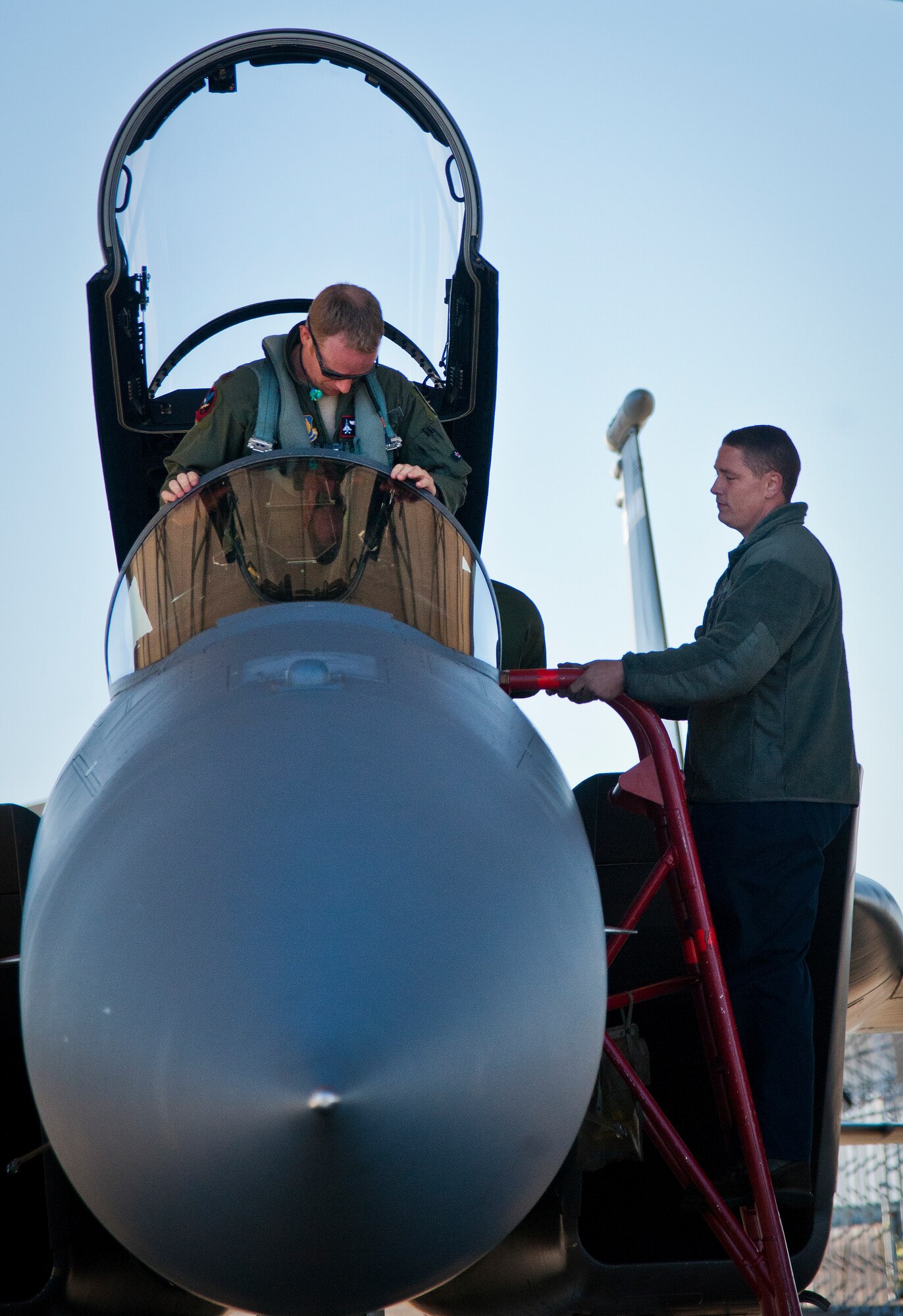 Maj. Christopher Wee, Operation Flight Program Combined Test Force, settles into his F-15 Eagle prior to a morning sortie at Eglin Air Force Base, Fla.  The OFPCTF Airmen fly test missions exclusively in various F-15 models. The OFPTCF is partially owned by both the 53rd Wing and 96th Test Wing. (U.S. Air Force photo/Samuel King Jr.)