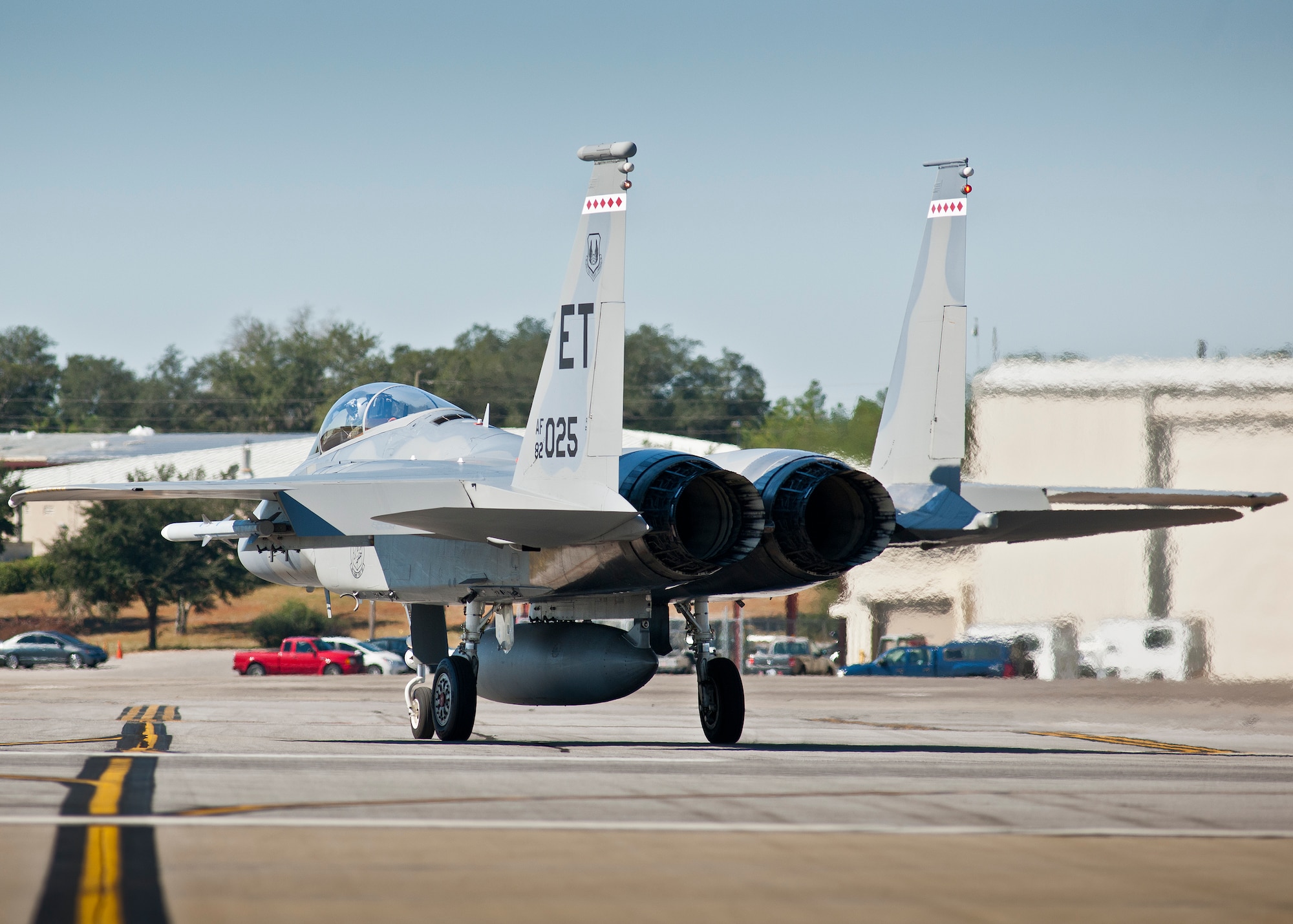 A 40th Flight Test Squadron F-15 Eagle rolls by along the Duke Field taxiway during a morning sortie.  The 40th FTS Airmen fly operational test missions in the F-16, F-15 and A-10. The 40th FTS is a squadron in the 96th Test Wing. (U.S. Air Force photo/Samuel King Jr.)