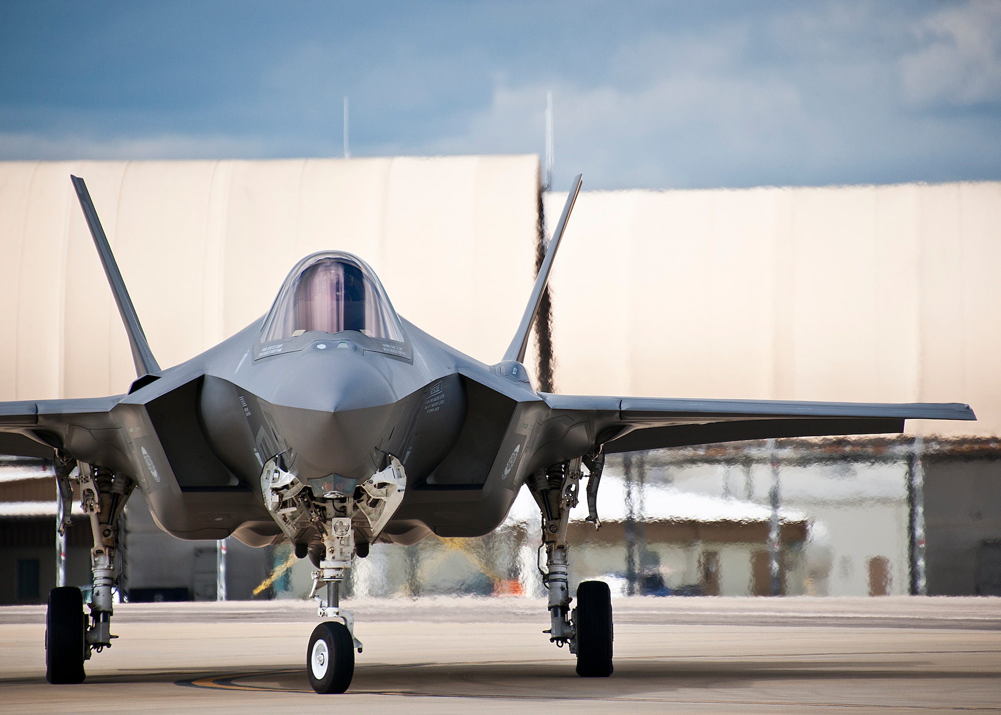 An F-35A Lightning II pilot turns his aircraft along the yellow taxi line on the 33rd Fighter Wing flightline at Eglin Air Force Base, Fla.  (U.S. Air Force photo/Samuel King Jr.)