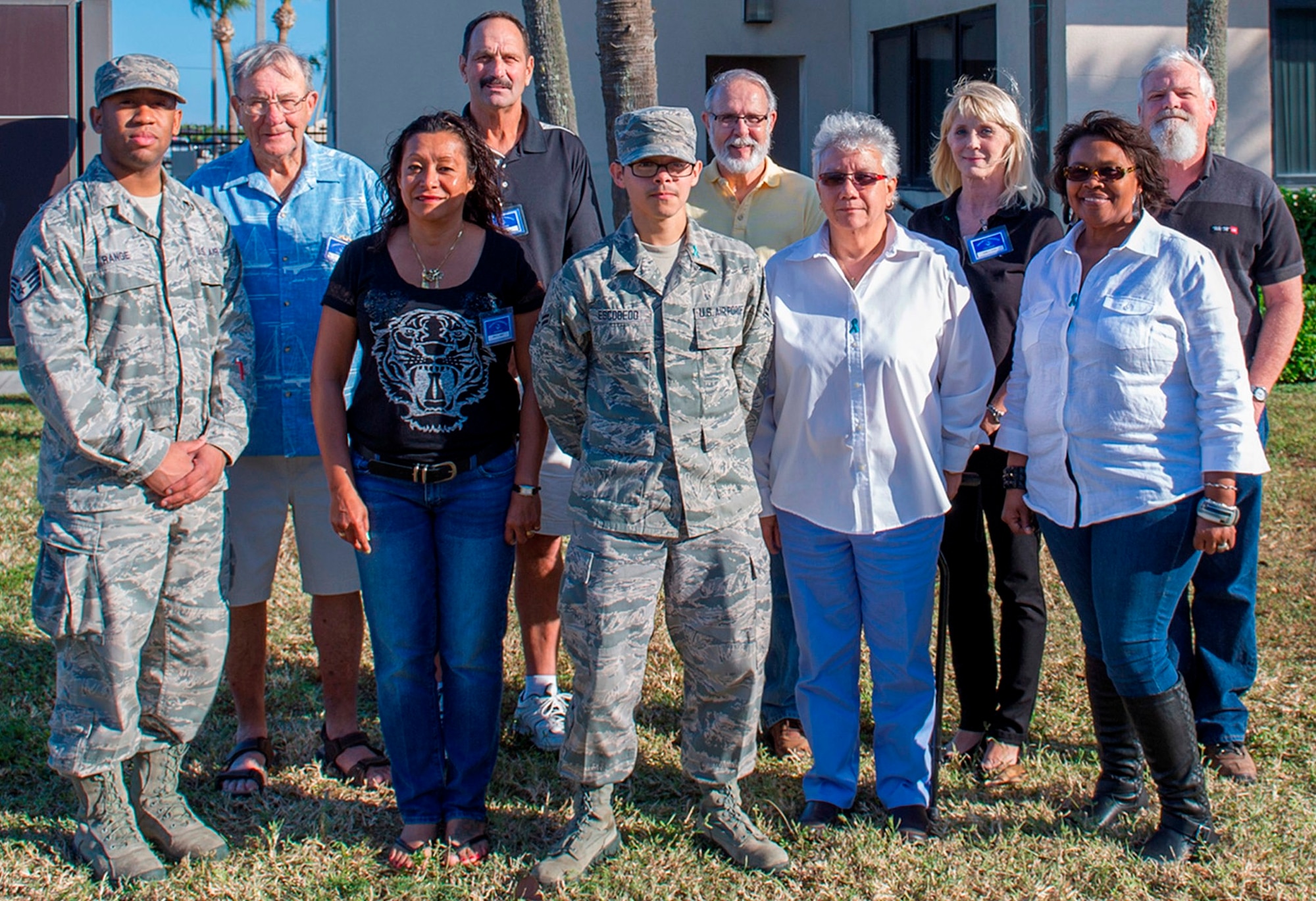 Members of the 45th Force Support Squadron Military Personnel Section's Customer Support Section pose with Project Emeritus volunteers, Nov. 7, 2014, at Patrick Air Force Base, Fla. Project Emeritus volunteers ensure customers have the proper documentation to receive an ID card, answer phones and help where needed. To volunteer, contact Project Emeritus at (321) 494-7656. (U.S. Air Force photo/Matthew Jurgens)